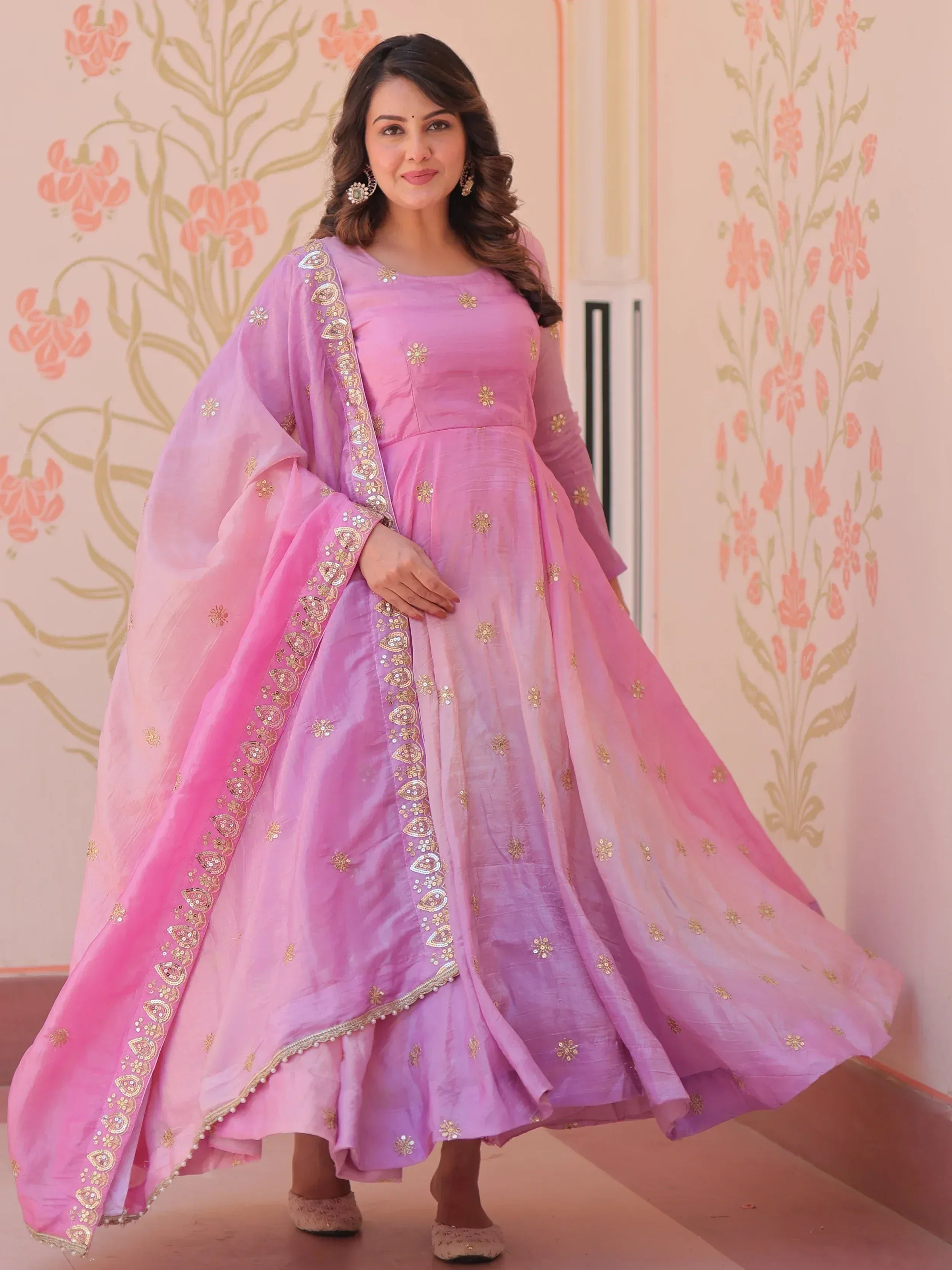 Pink embroidered anarkali suit with gold detailing, perfect for Indian ethnic occasions and festive wear.