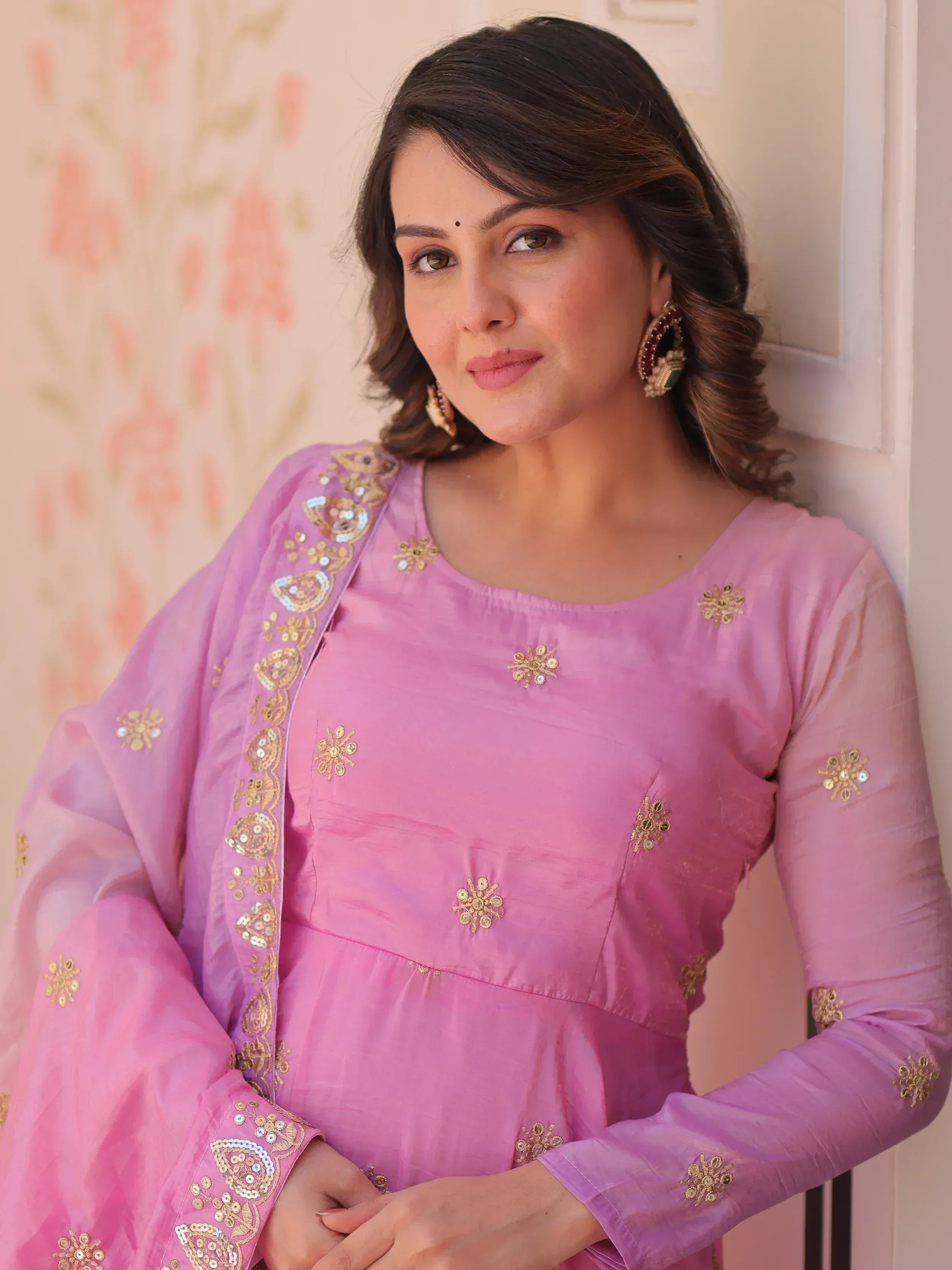 Pink embroidered ethnic kurti with gold floral motifs and matching dupatta, styled for Indian wear
