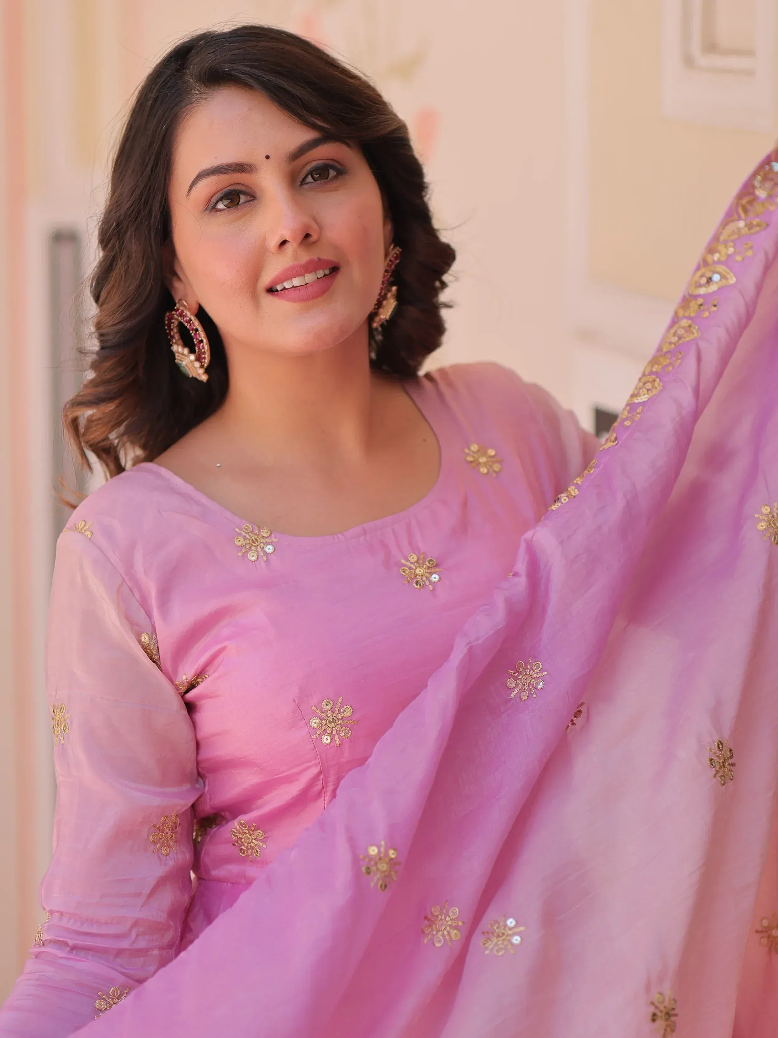 Pink ethnic salwar kameez with gold embroidery and mirror work, perfect for Indian festive occasions