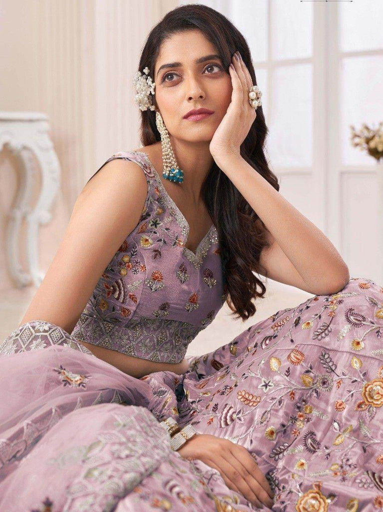 Exquisite Purple Embroidered Art Silk Wedding Wear Lehenga Choli