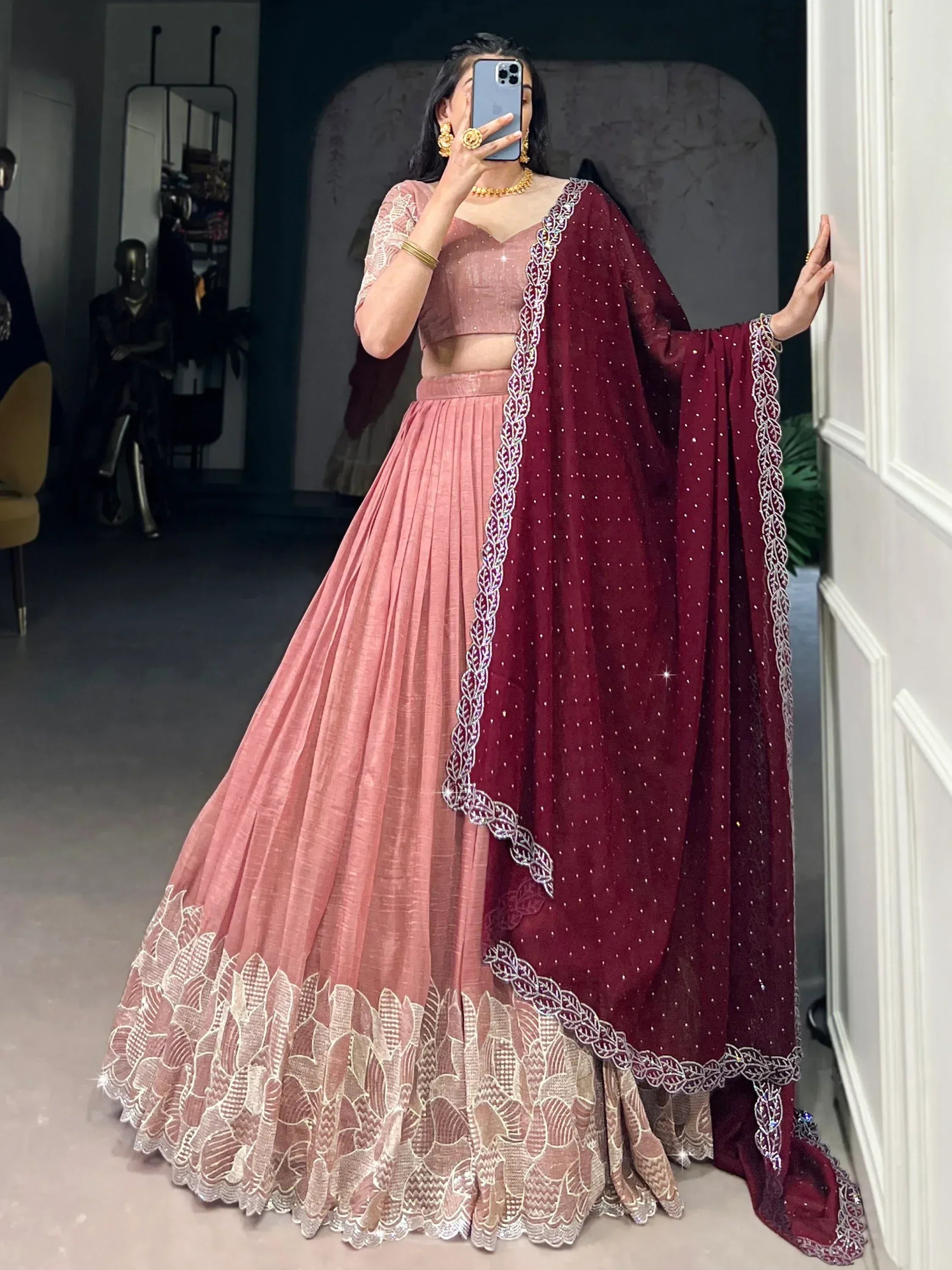 Pink lehenga choli with maroon dupatta, floral lace, and sequin embroidery for Indian ethnic wear