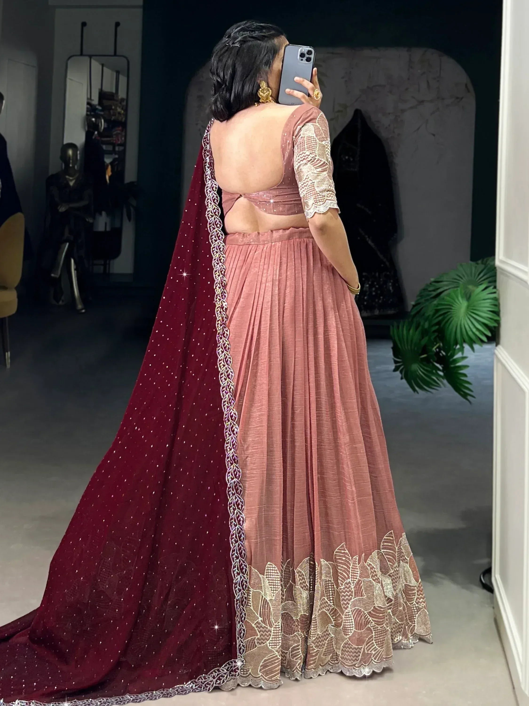 Dusty pink lehenga choli with backless blouse, gold embroidery, and maroon dupatta for Indian ethnic wear