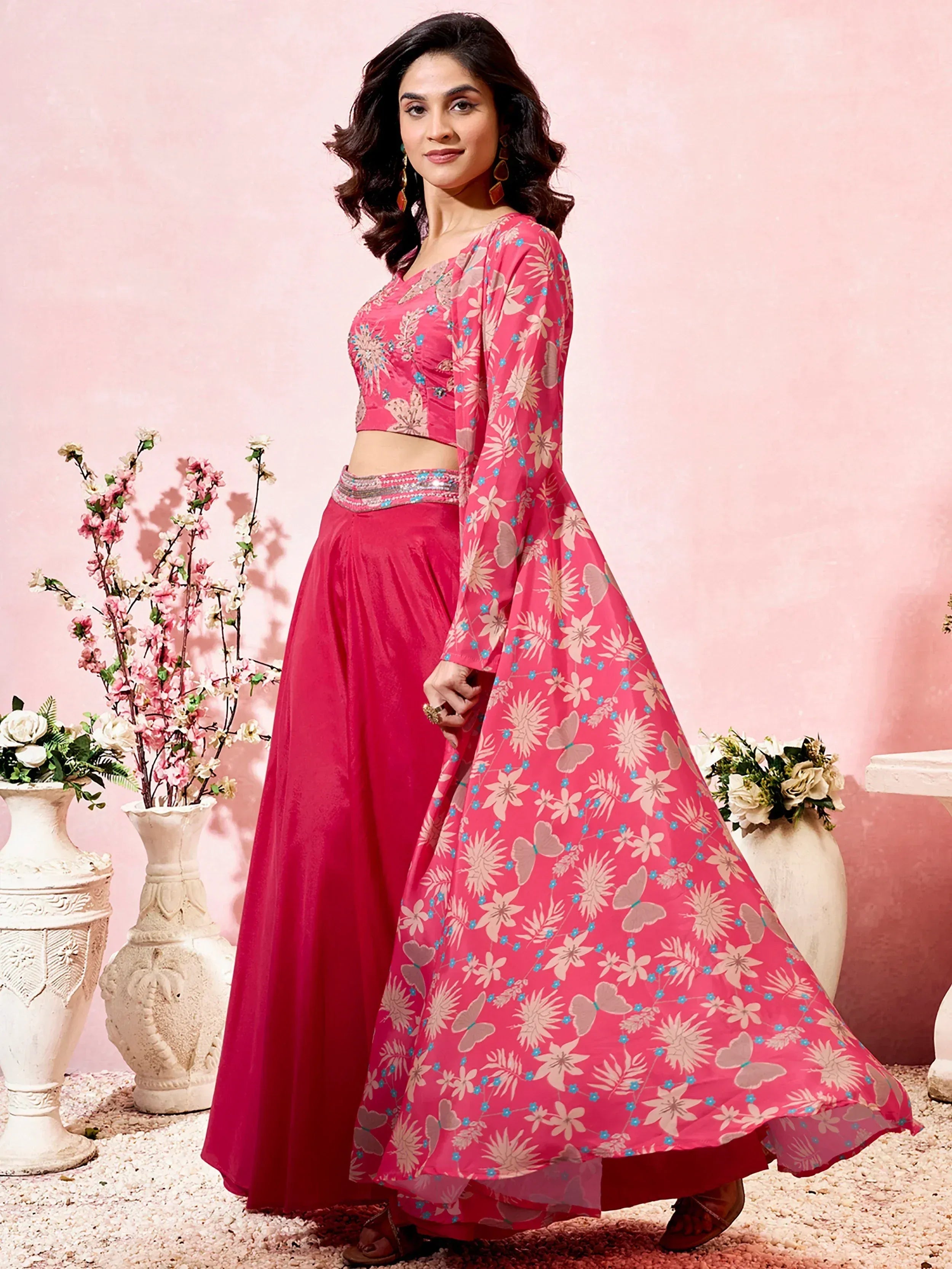 Pink floral print lehenga choli with butterfly motifs, perfect for Indian ethnic occasions
