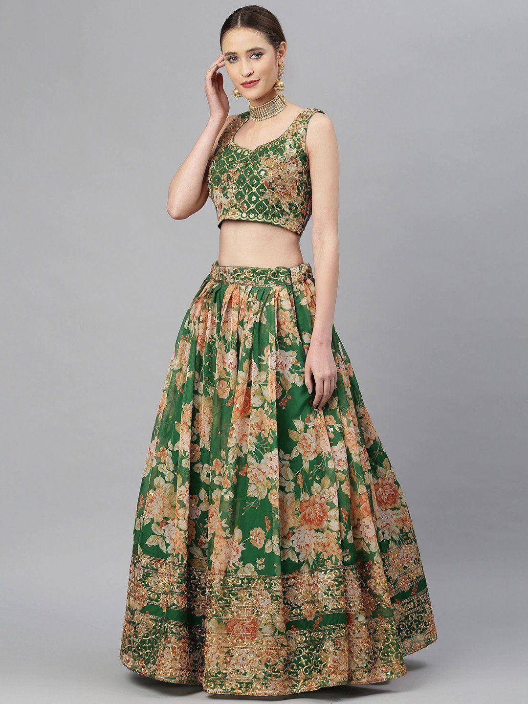 Green floral lehenga choli with gold embroidery, perfect for Indian ethnic wear and festive occasions.