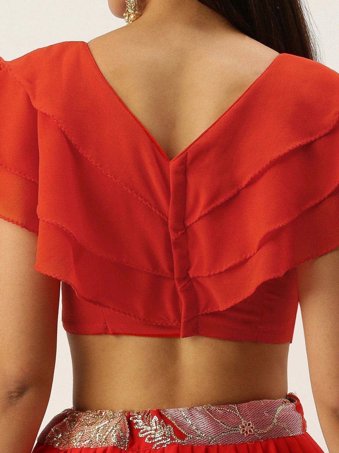 Red lehenga choli with ruffled back blouse and embroidered waistband, ethnic Indian wear