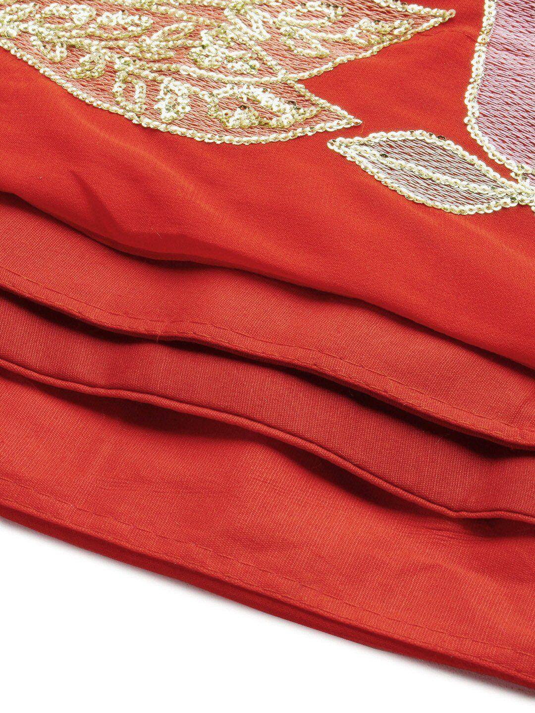 Red ethnic saree with gold sequin embroidery, perfect for Indian festive occasions