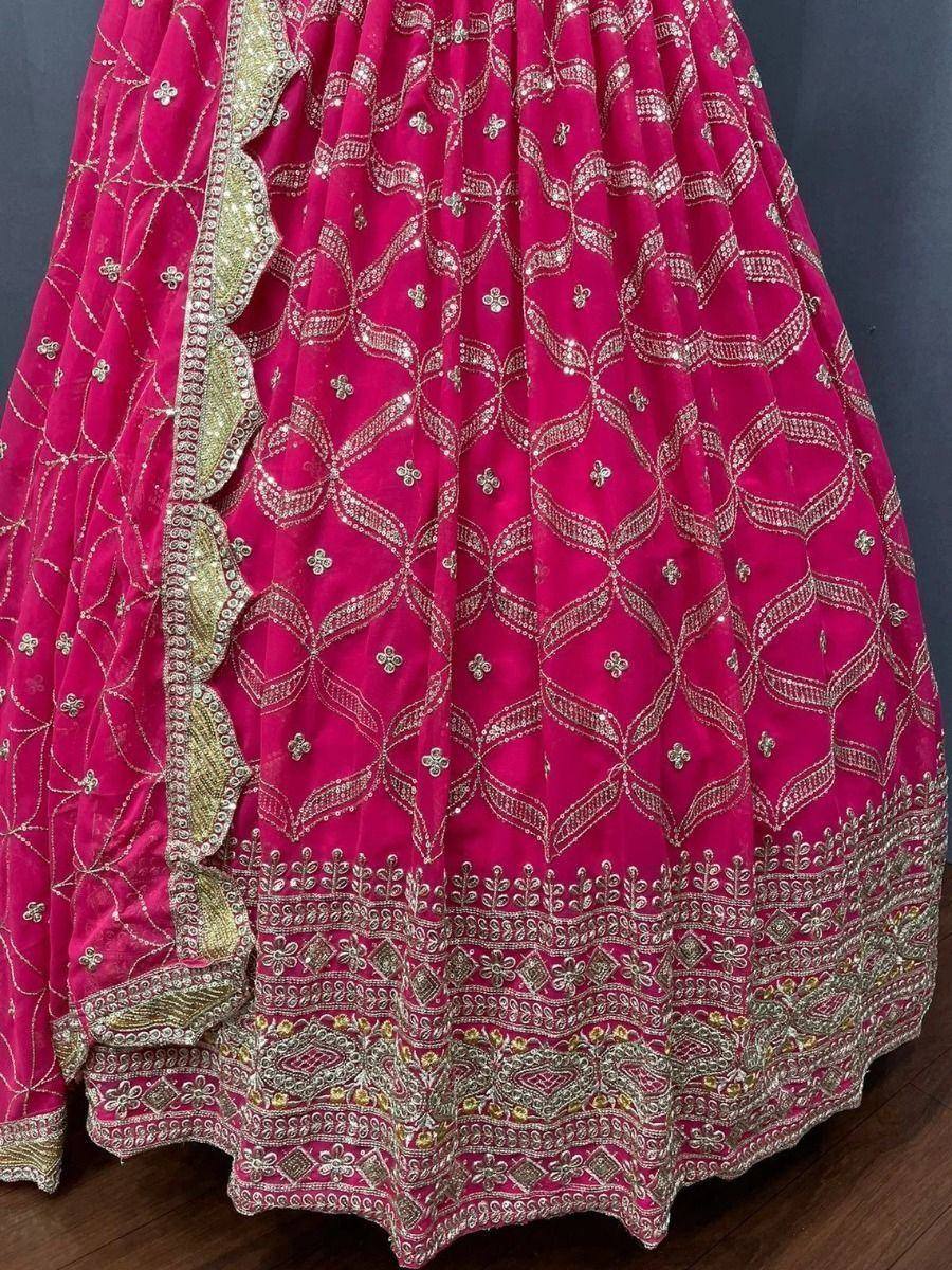 Fuchsia lehenga with gold embroidery and scalloped border, ethnic Indian wedding wear