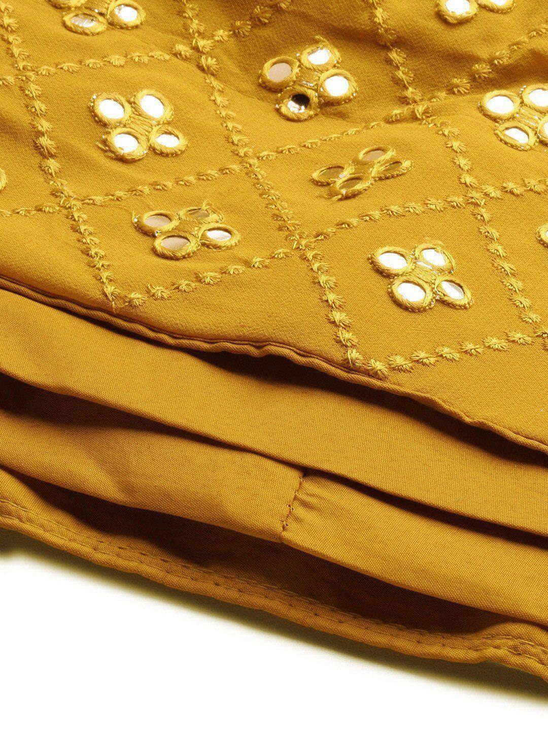 Mustard yellow ethnic fabric with mirror work and embroidery, ideal for lehenga choli or saree