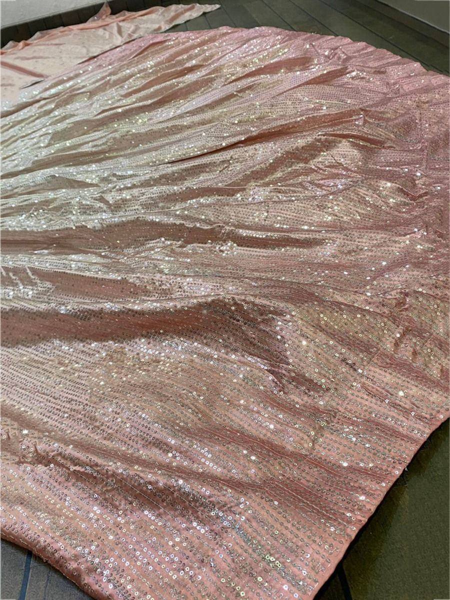 Pink sequin lehenga fabric with shimmering embellishments for ethnic wear