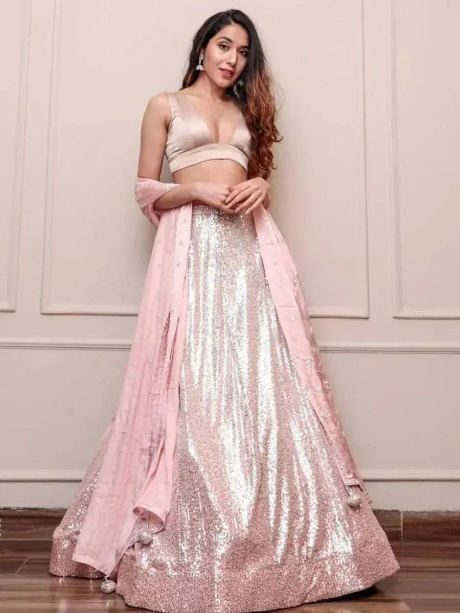 Pink sequin lehenga choli with matching dupatta, perfect for Indian weddings and festive occasions