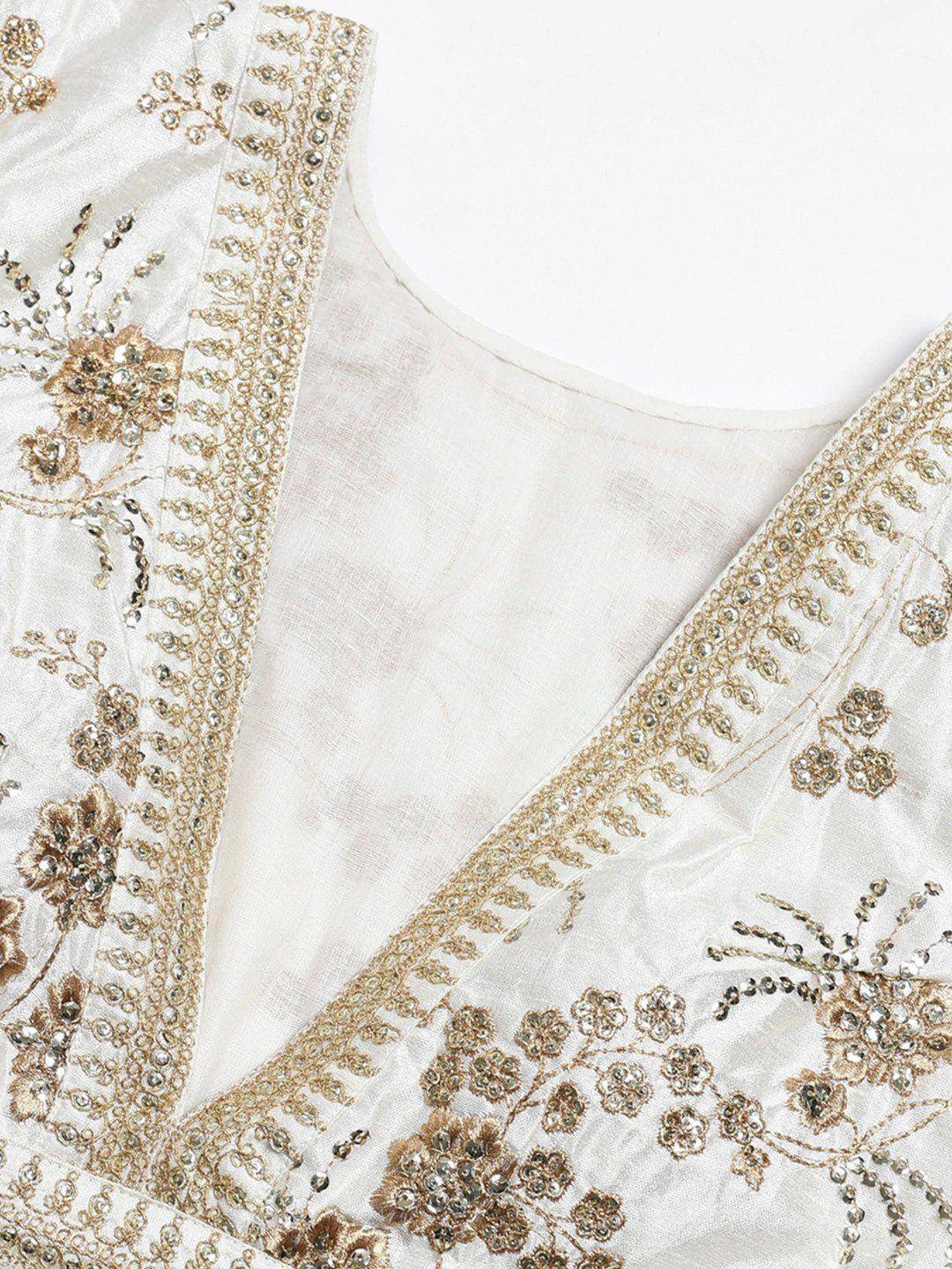White ethnic gown with gold floral embroidery and beadwork, perfect for Indian weddings or festive occasions.