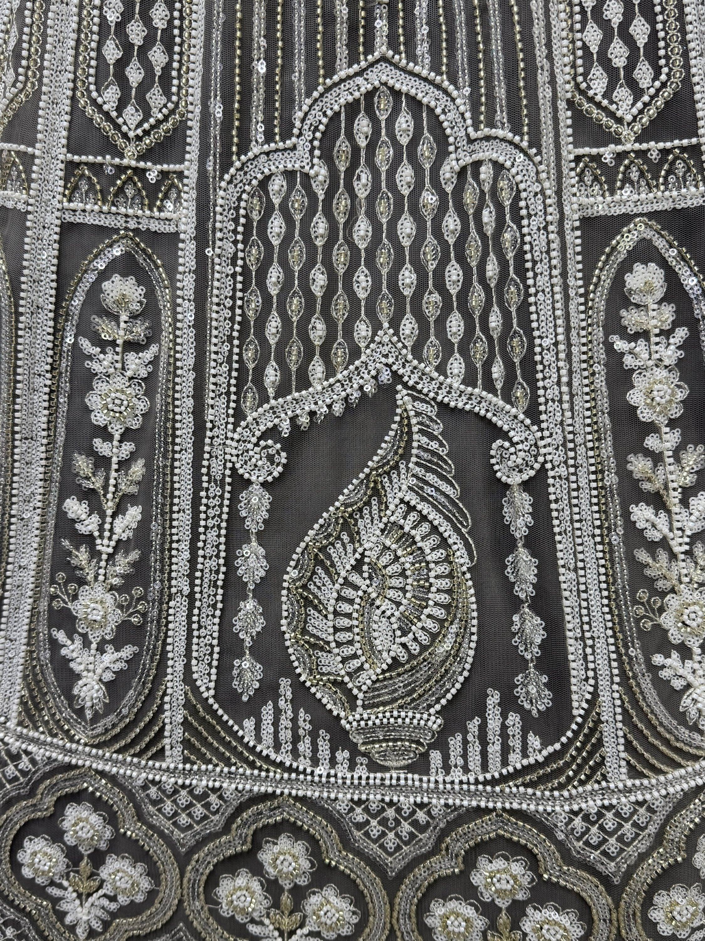 Exquisite silver and white beadwork on black net fabric, perfect for designer lehenga or ethnic gown.