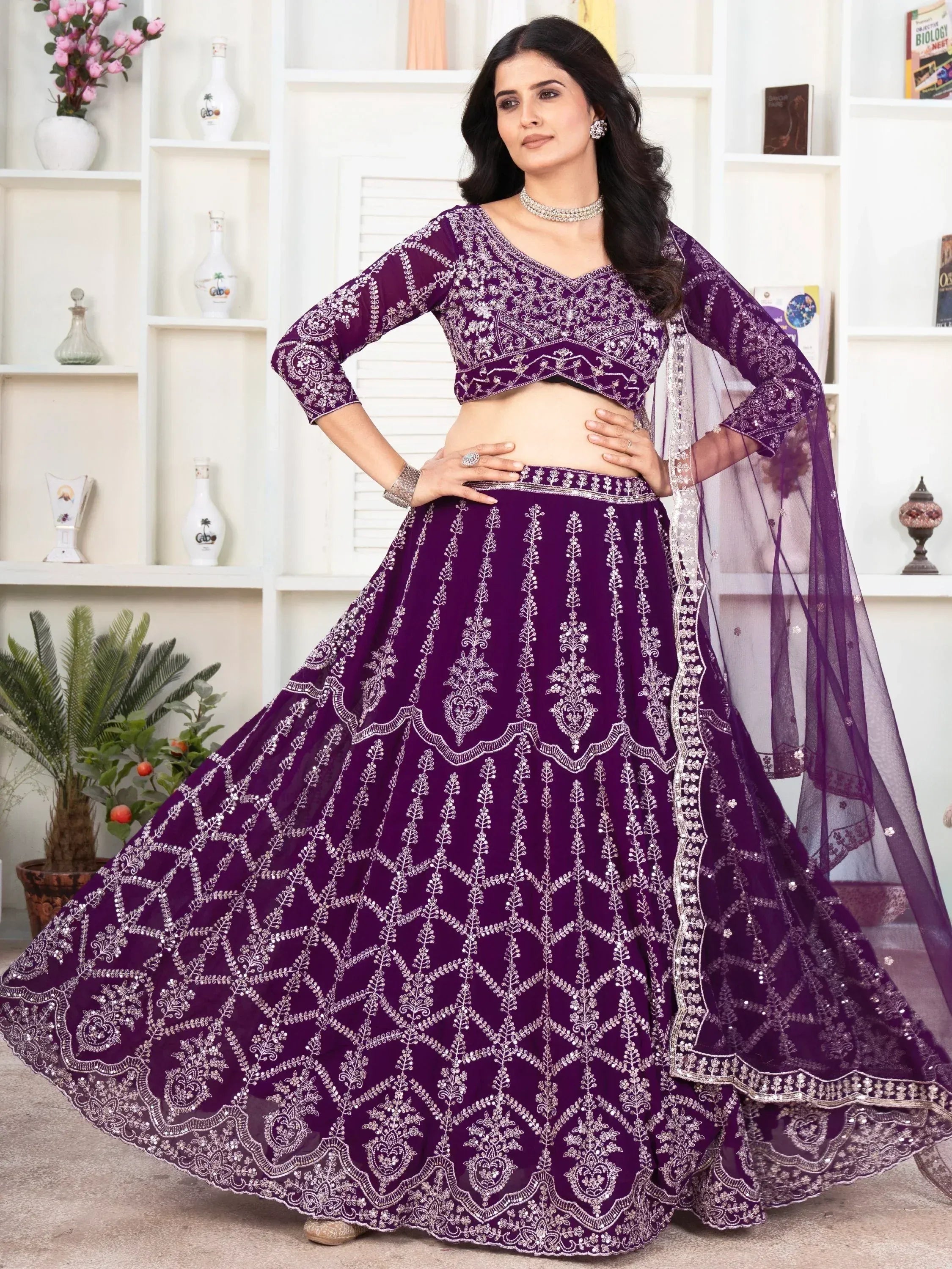 Purple embroidered lehenga choli with silver work, perfect for Indian weddings and festive occasions