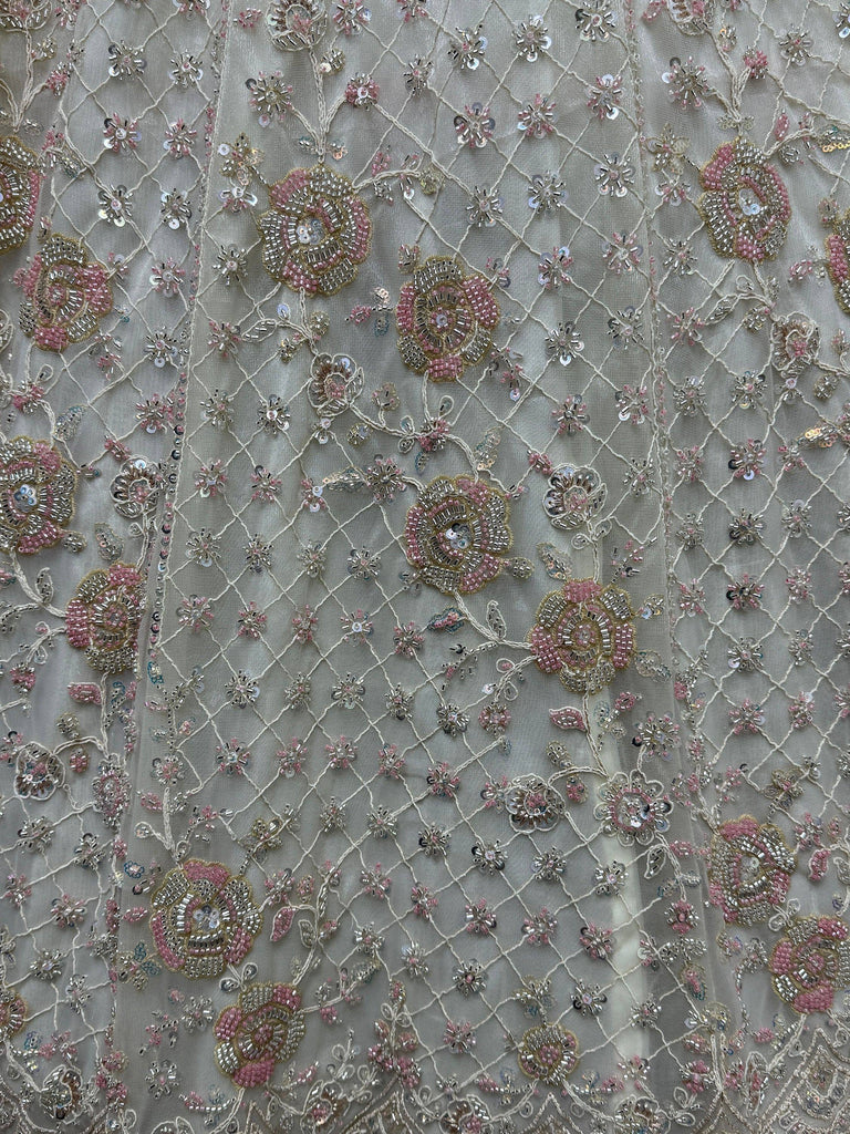 Pink and gold floral embroidery with sequins on sheer net fabric for ethnic wear
