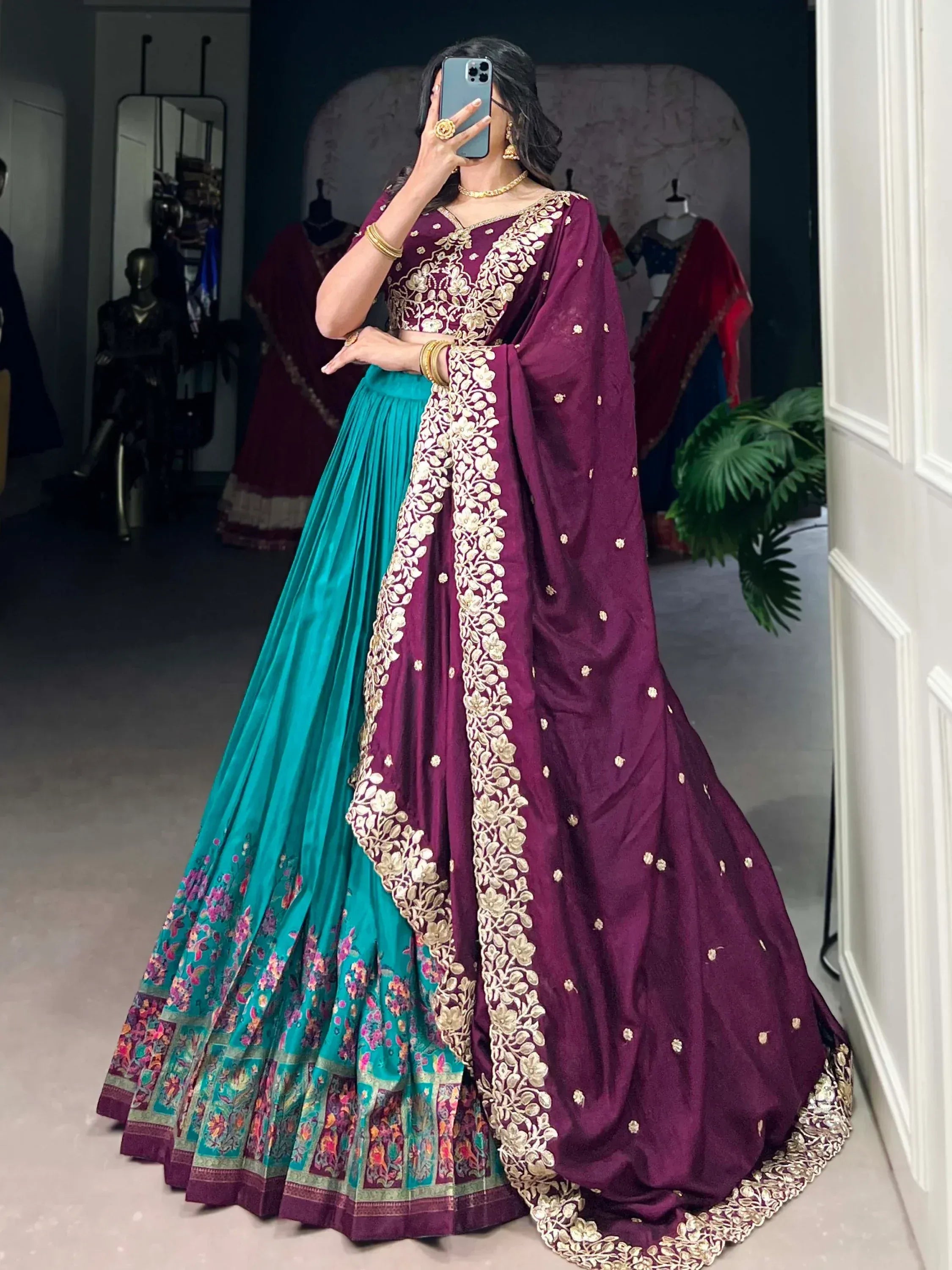 Purple and teal designer lehenga choli with gold embroidery, perfect for Indian ethnic wear occasions