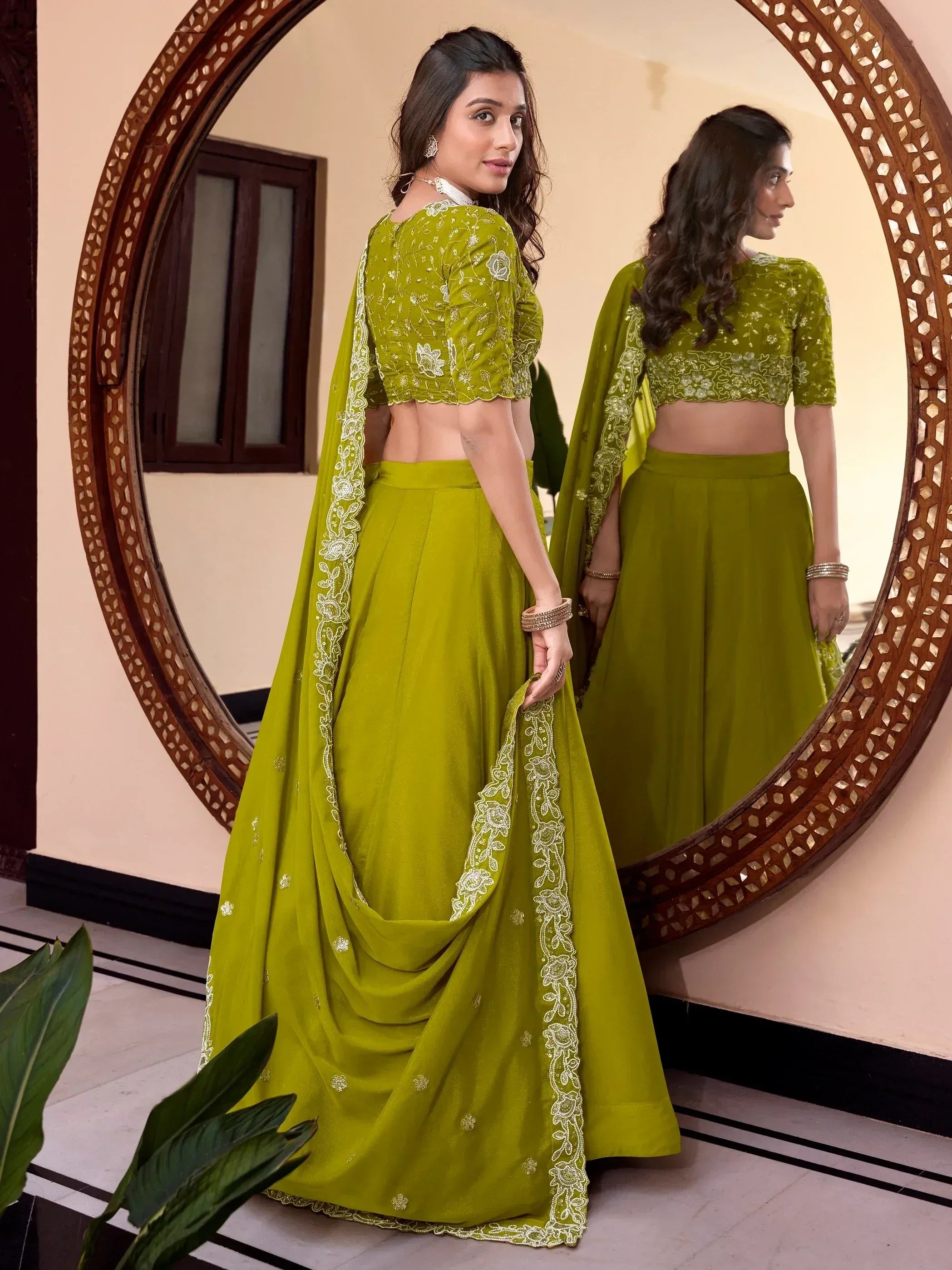 Olive green embroidered lehenga choli with lace dupatta, perfect for Indian ethnic wear occasions