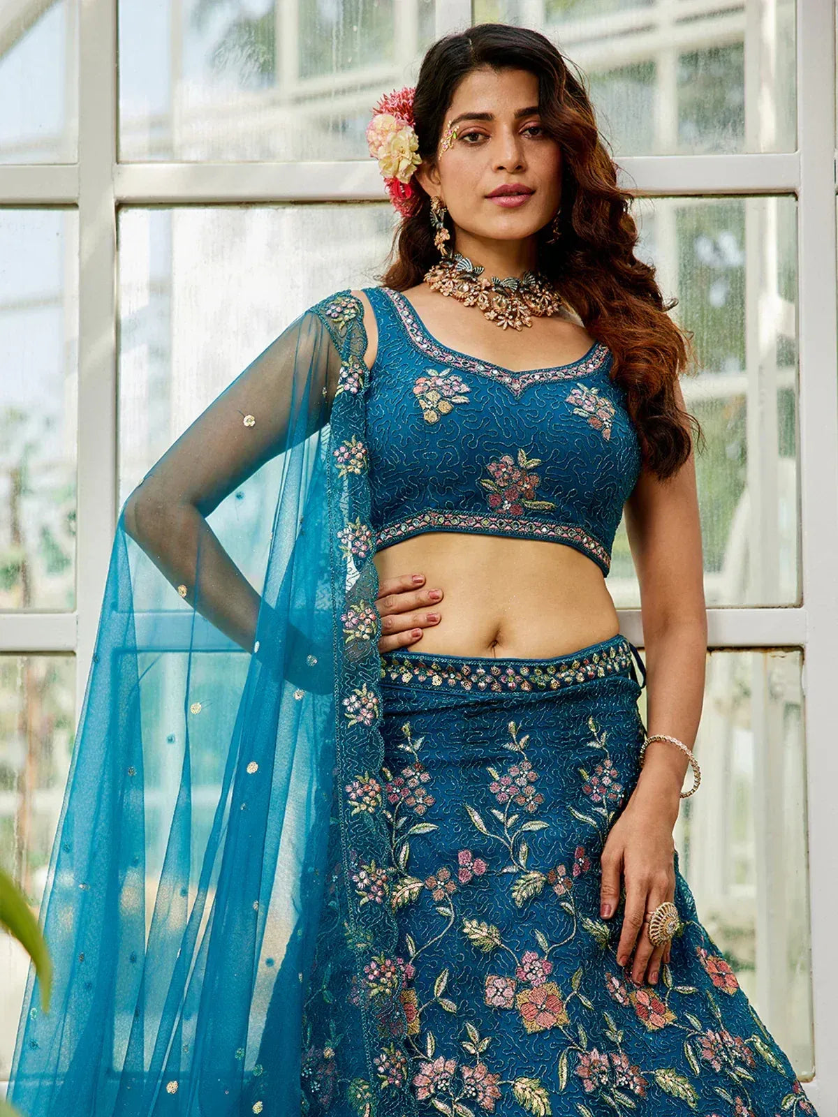 Blue floral embroidered lehenga choli with sheer dupatta, perfect for Indian ethnic wear occasions