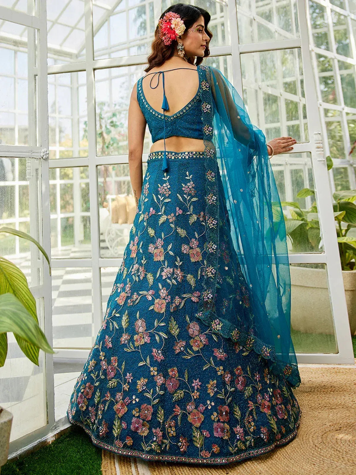 Blue floral embroidered lehenga choli with sheer dupatta, perfect for Indian ethnic occasions