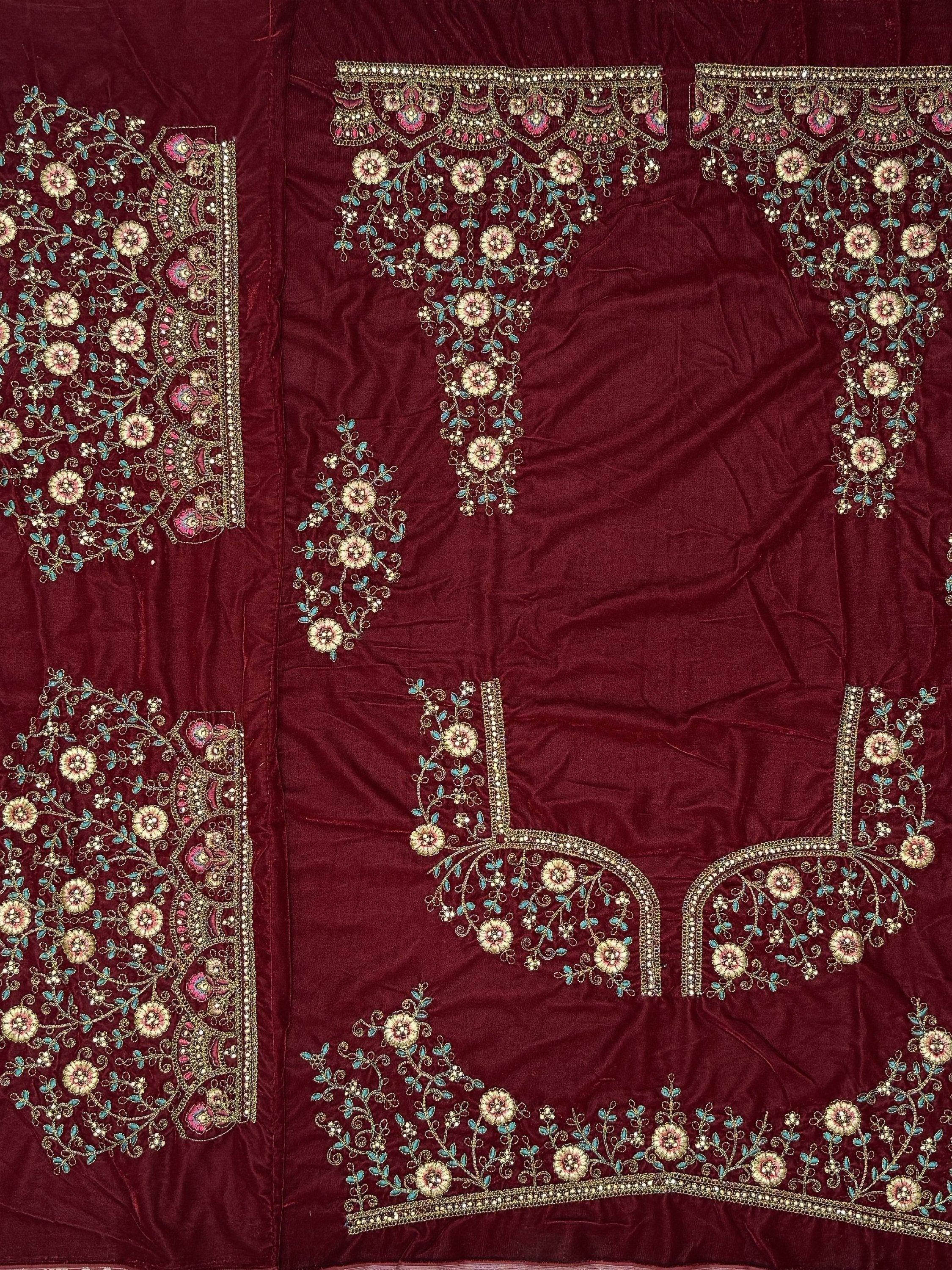 Maroon velvet ethnic wear with intricate floral embroidery and beadwork for designer lehenga choli