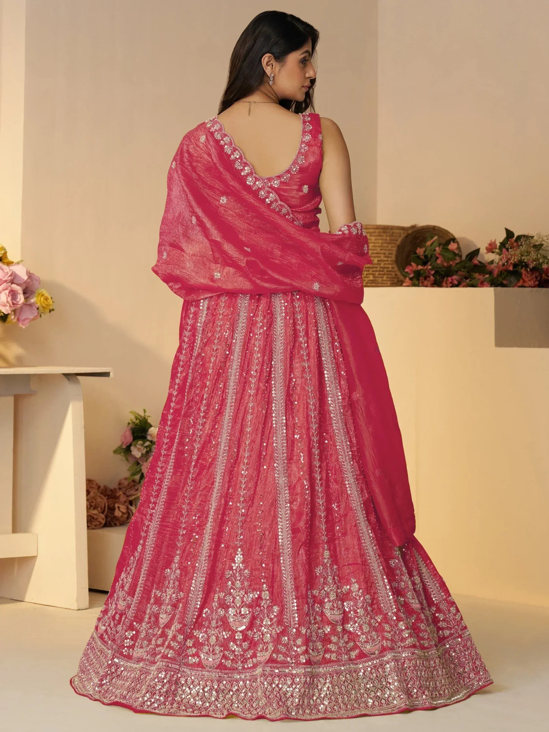 Purple and pink embroidered lehenga choli with gold detailing, perfect for Indian ethnic wear occasions
