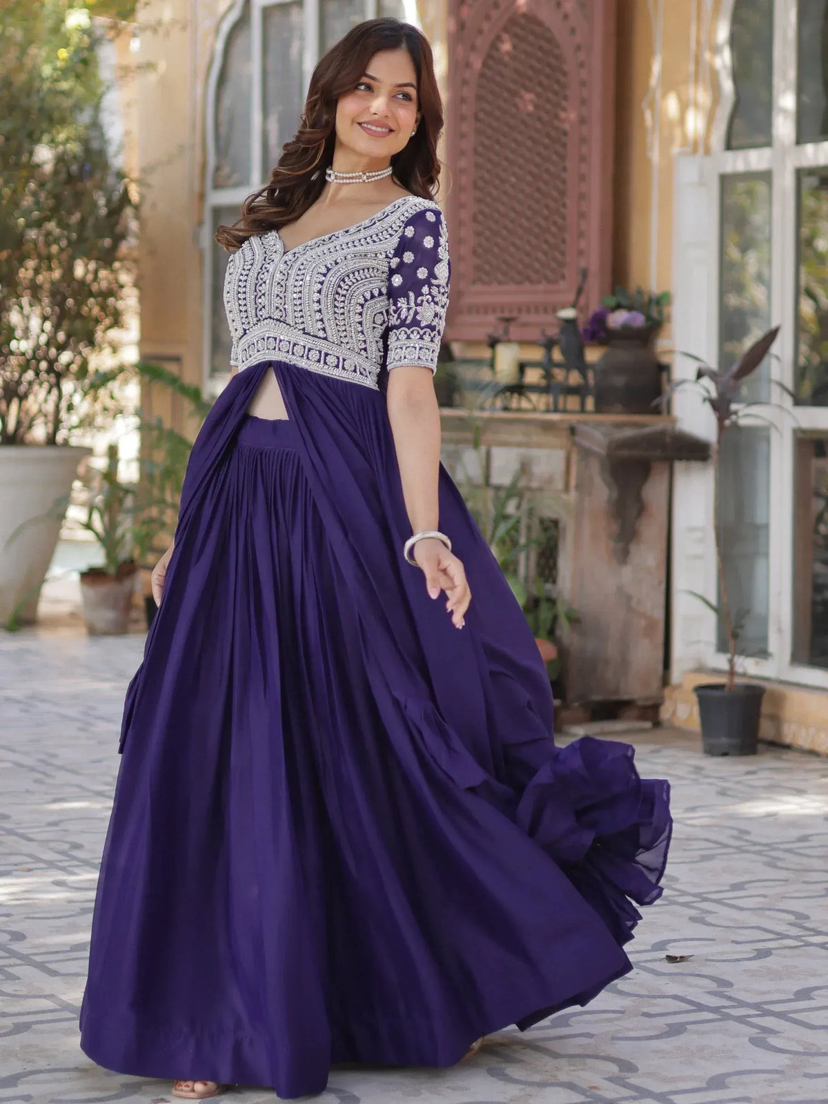 Purple ethnic gown with silver embroidery, perfect for Indian weddings and festive occasions