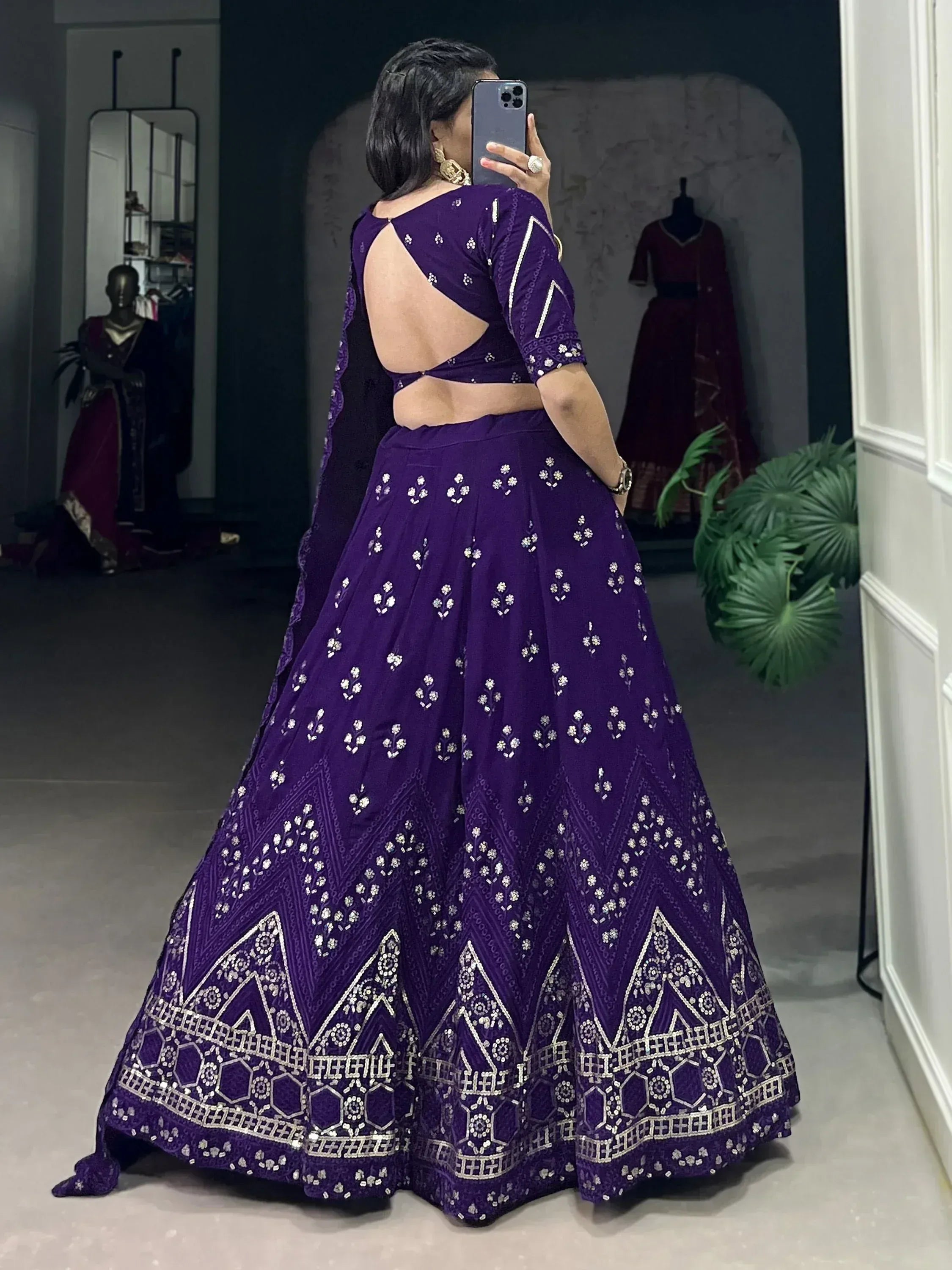 Purple designer lehenga choli with mirror work and back cutout, ethnic Indian wear