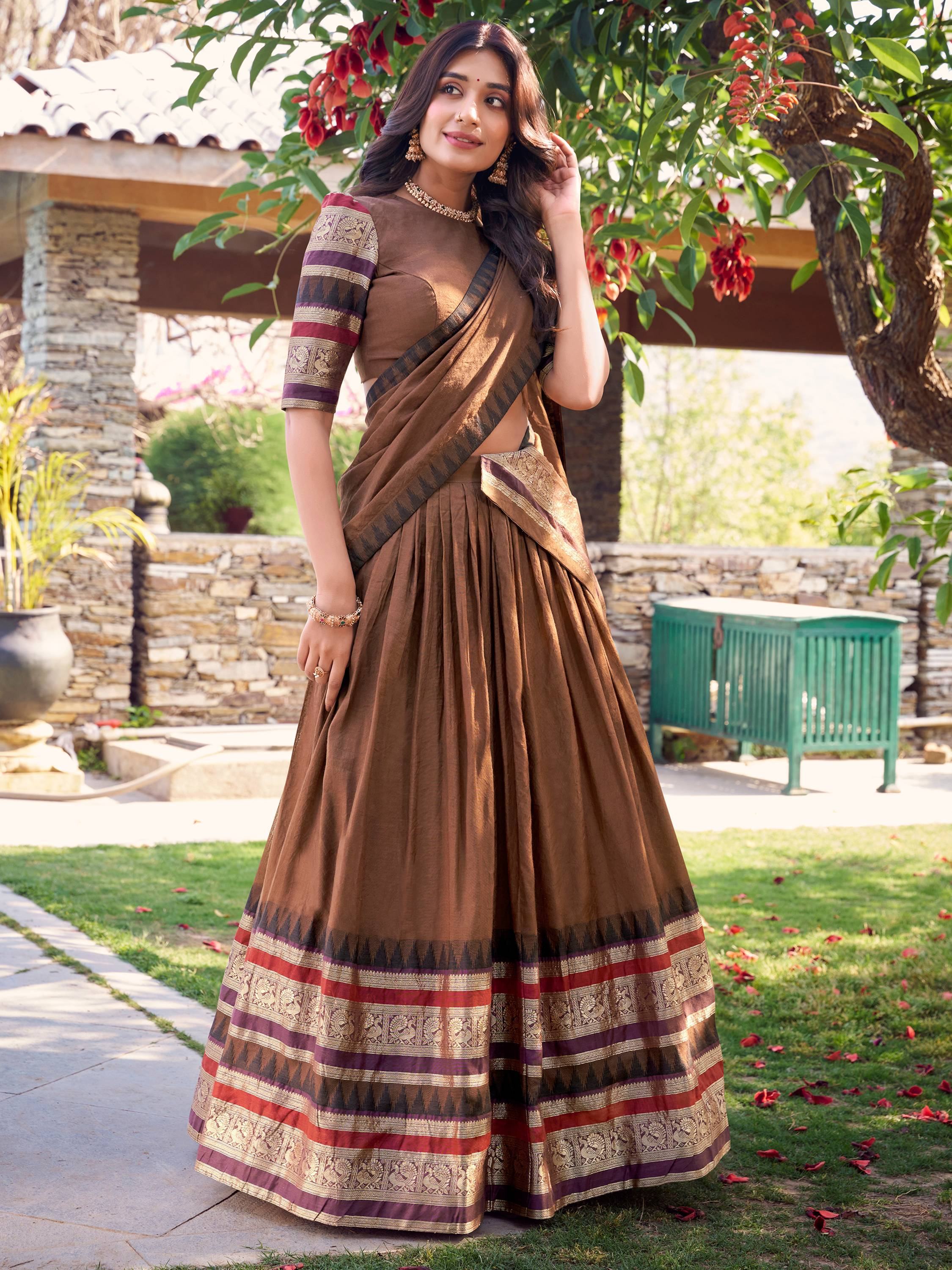 Brown ethnic lehenga choli with gold and red border, perfect for Indian occasions