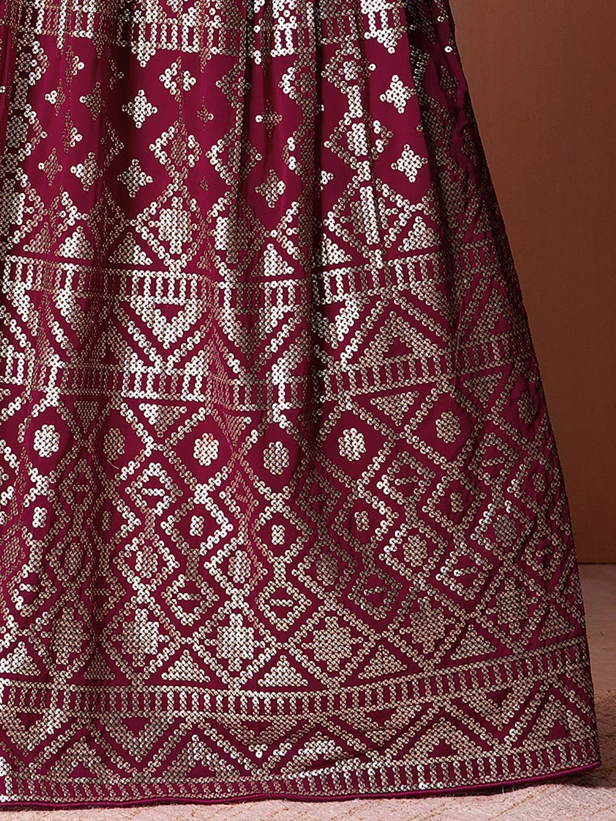 Maroon lehenga with intricate gold geometric embroidery, ethnic Indian wear