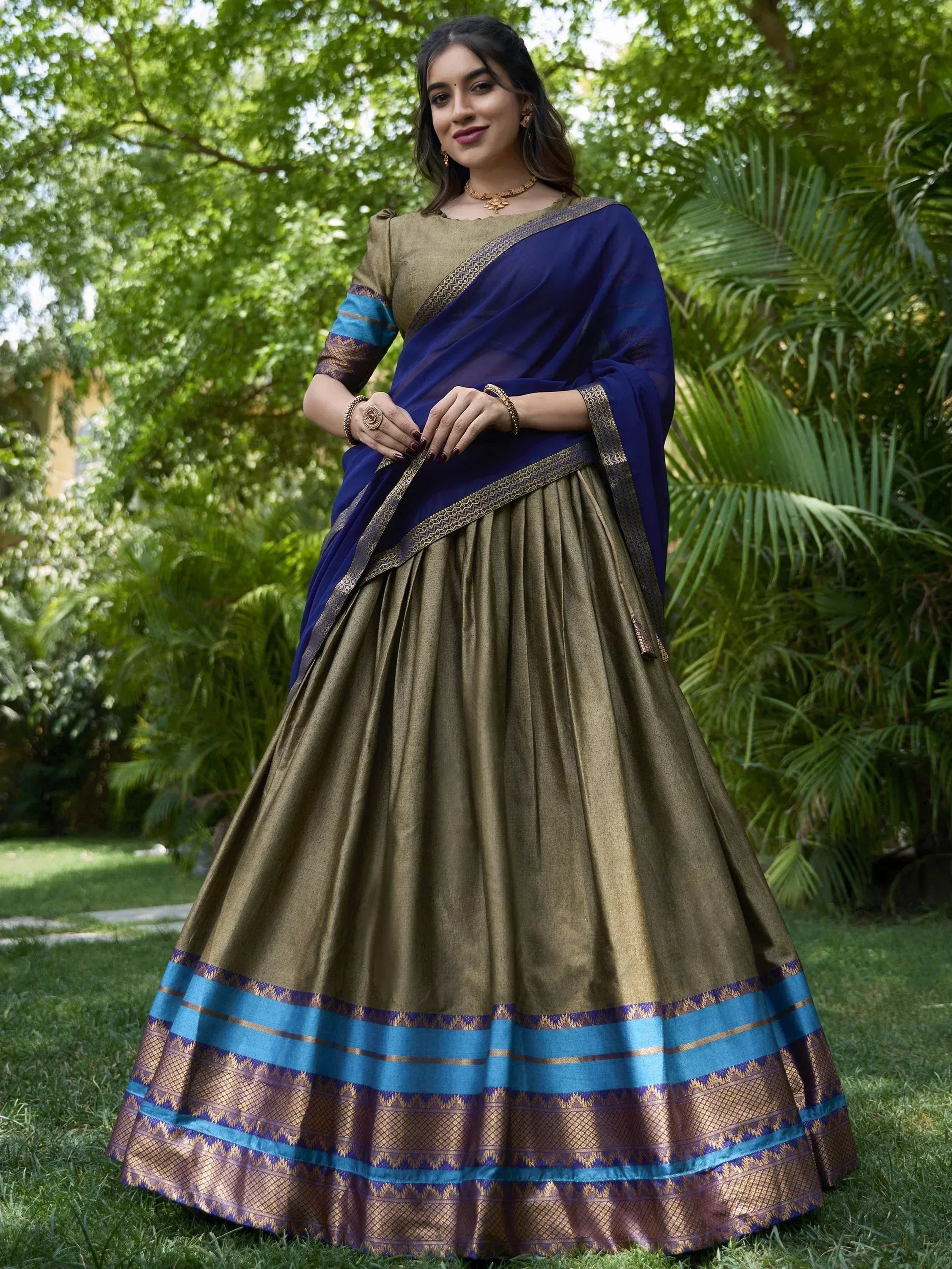 Elegant olive green lehenga choli with blue dupatta, perfect for Indian ethnic wear occasions