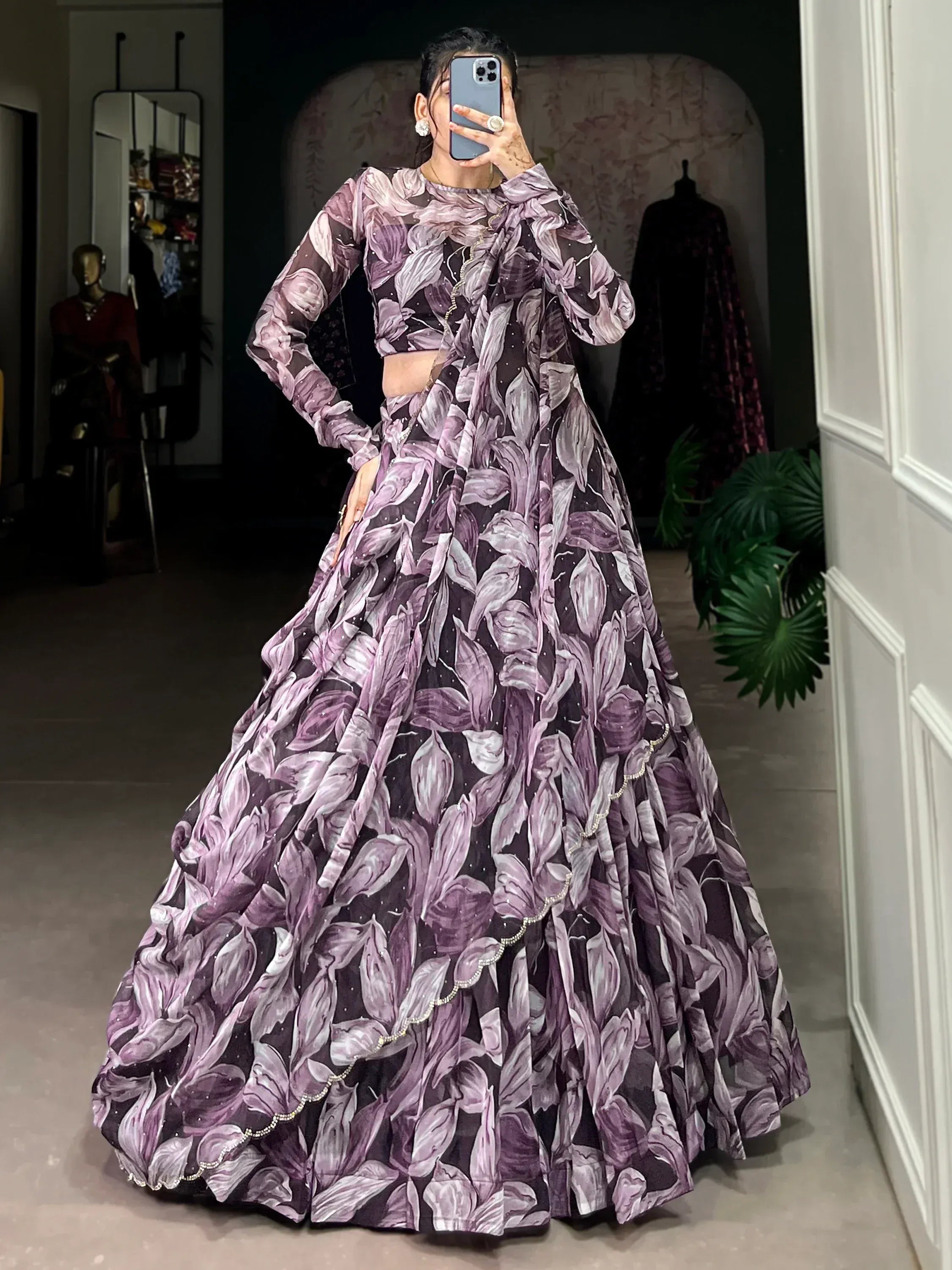 Purple floral print lehenga choli with long sleeves and embellished hem, perfect for Indian ethnic occasions