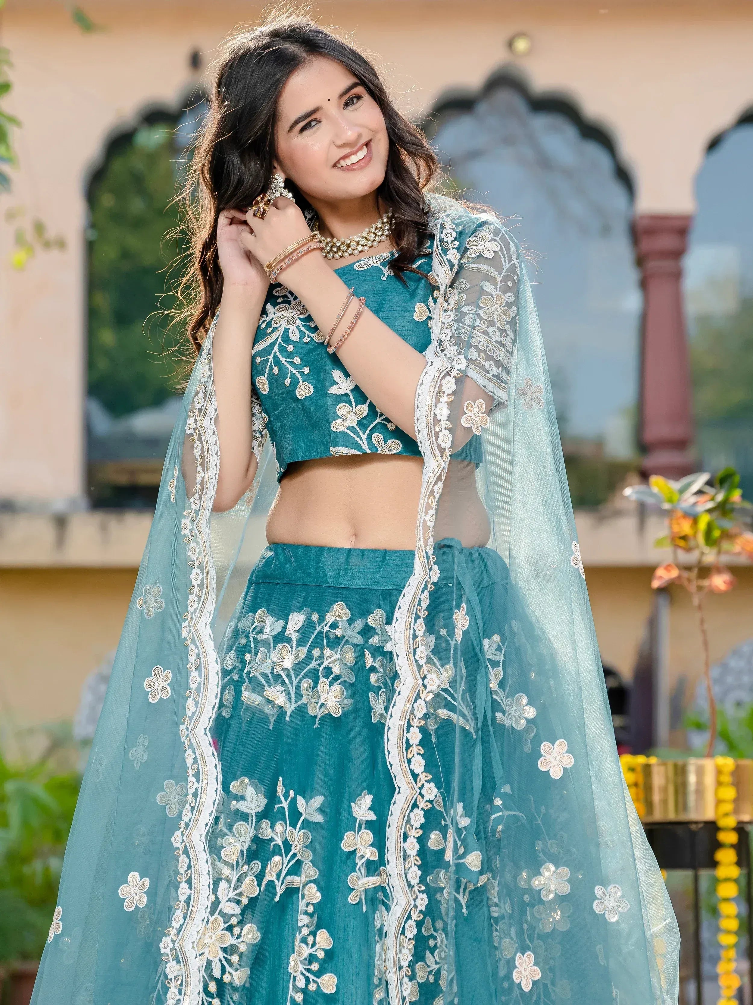 Teal embroidered lehenga choli with floral net dupatta, Indian ethnic wear for women
