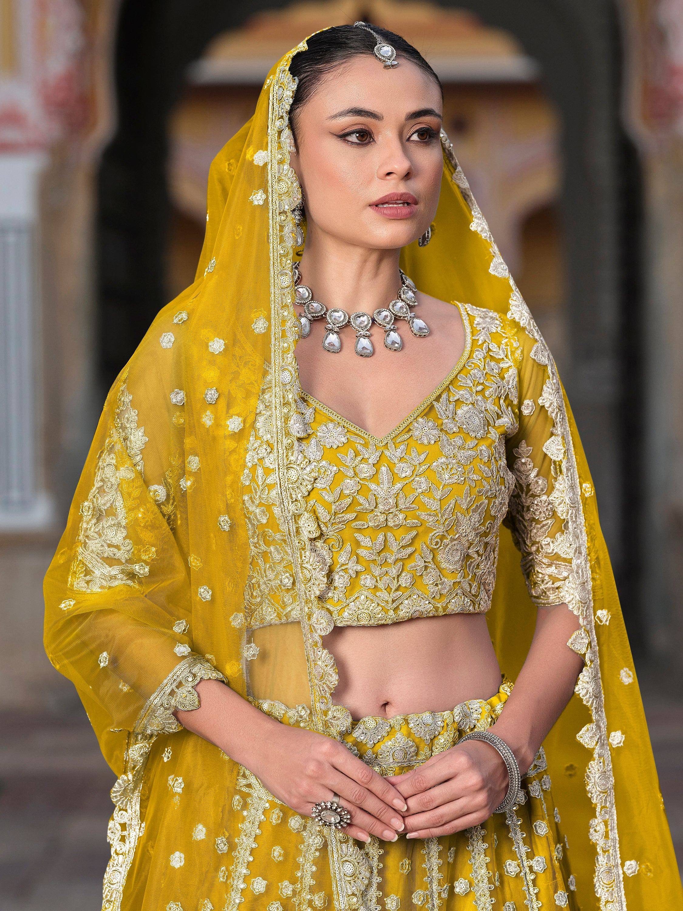Yellow embroidered lehenga choli with dupatta, Indian ethnic wear for weddings and festivals