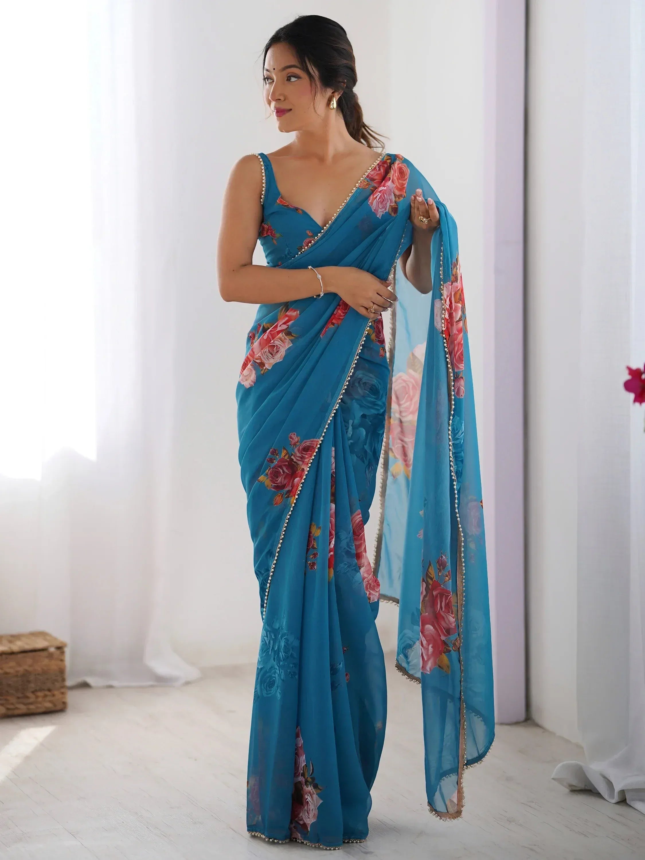 Blue floral print saree with pearl border, stylish Indian ethnic wear for women