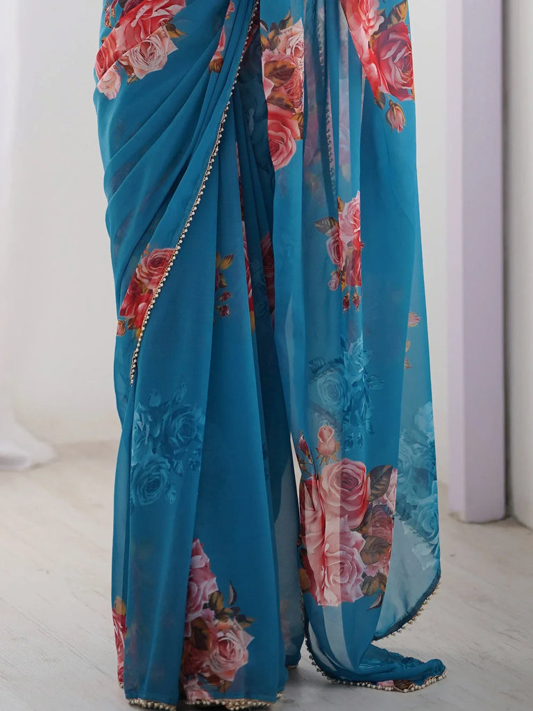 Teal floral saree with rose print and pearl border, Indian ethnic wear