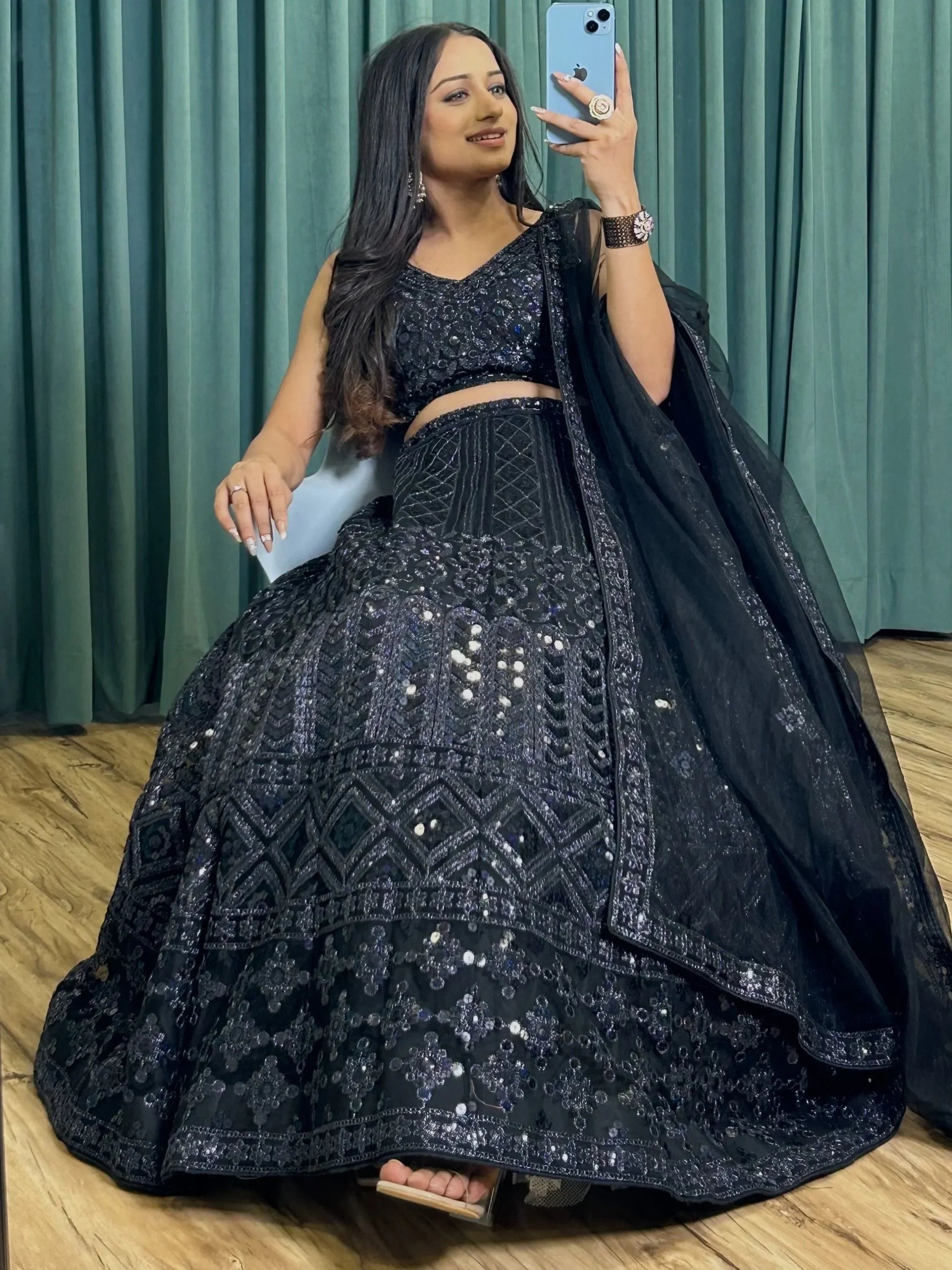 Black sequined lehenga choli with heavy embroidery, perfect for Indian ethnic wear events