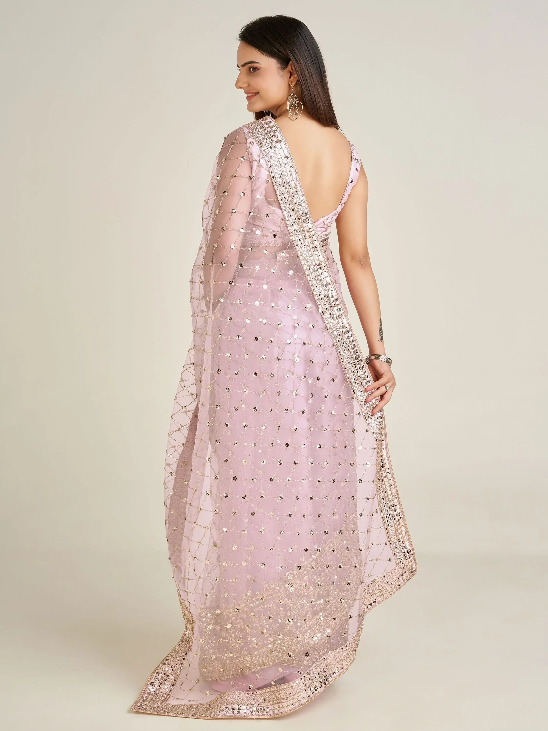 Glamorous Light Pink Sequins Net Wedding Wear Saree With Blouse