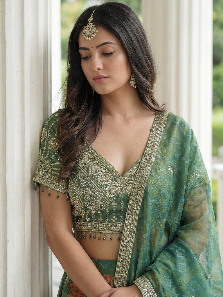 Glamorous Green Zari Embroidered Kanjivaram Wedding Wear Lehenga Choli