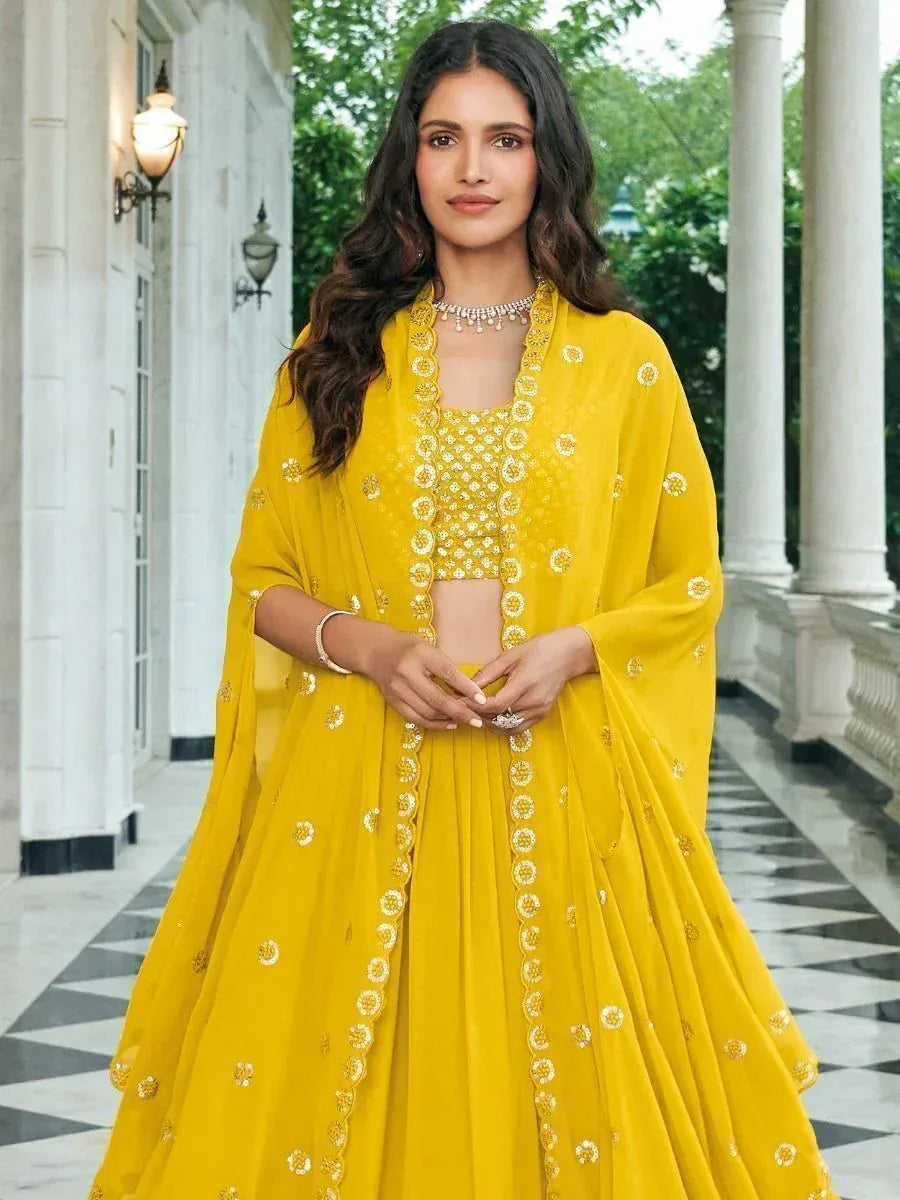 Yellow embroidered lehenga choli with dupatta, Indian ethnic wear for weddings and festivals