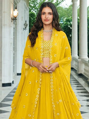 Opulent Yellow Sequined Georgette Party Wear Lehenga Choli with Shrug