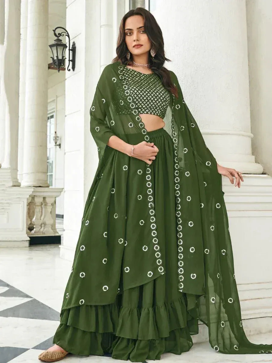 Olive green designer lehenga choli with white embroidery, ruffled skirt, and sheer dupatta for ethnic wear
