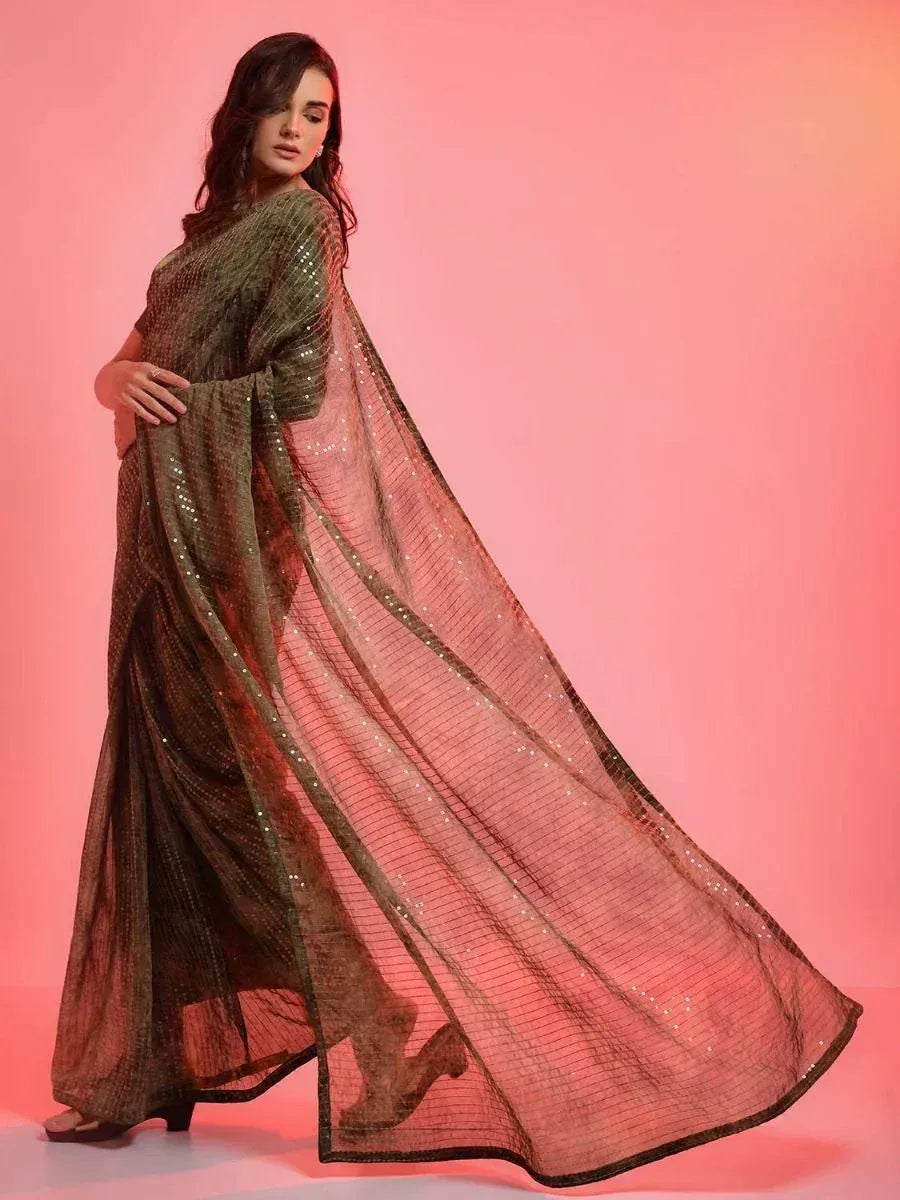 Elegant olive green sequin saree with sheer pallu, perfect for Indian ethnic occasions