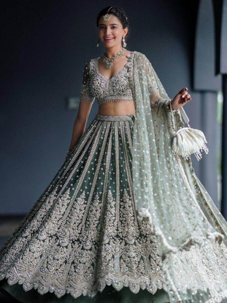 Alluring Green Sequins Net Engagement Wear Lehenga Choli With Dupatta
