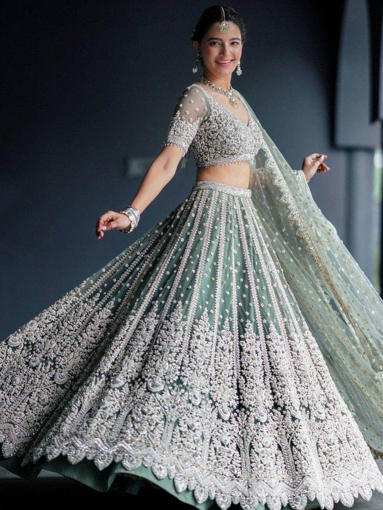 Alluring Green Sequins Net Engagement Wear Lehenga Choli With Dupatta