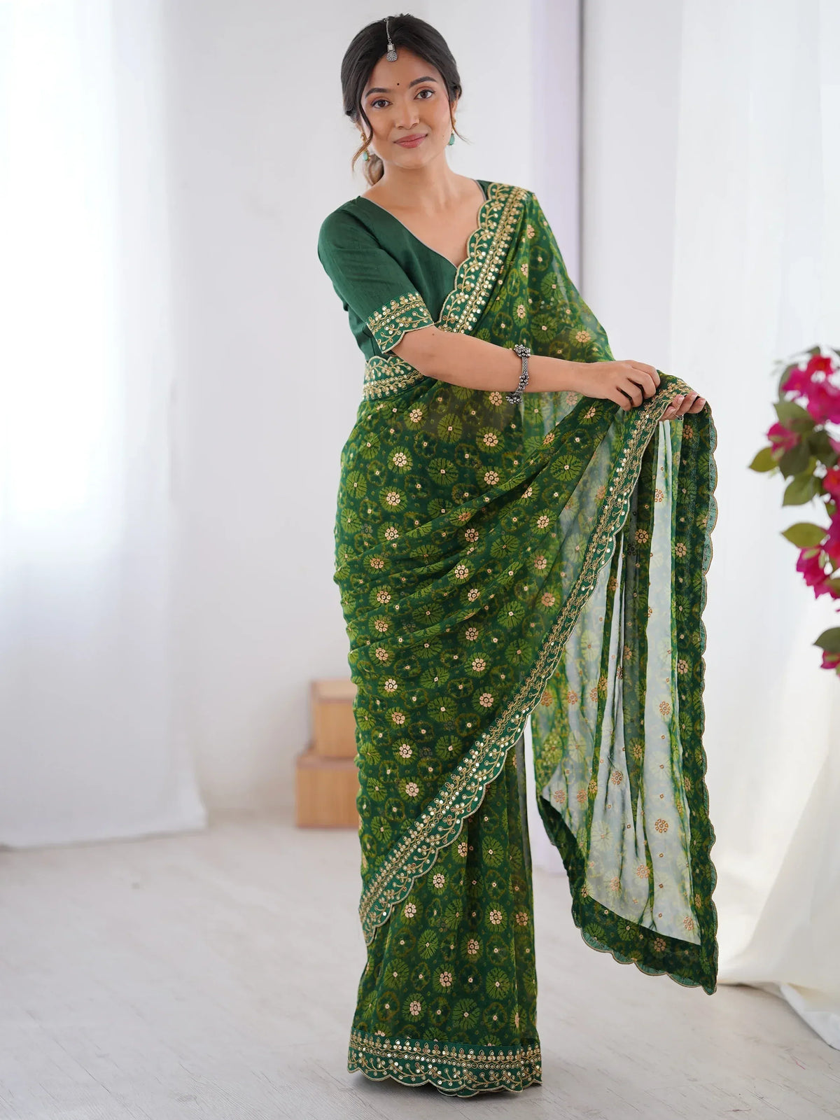 Green floral printed saree with gold embroidery, perfect for Indian ethnic wear occasions