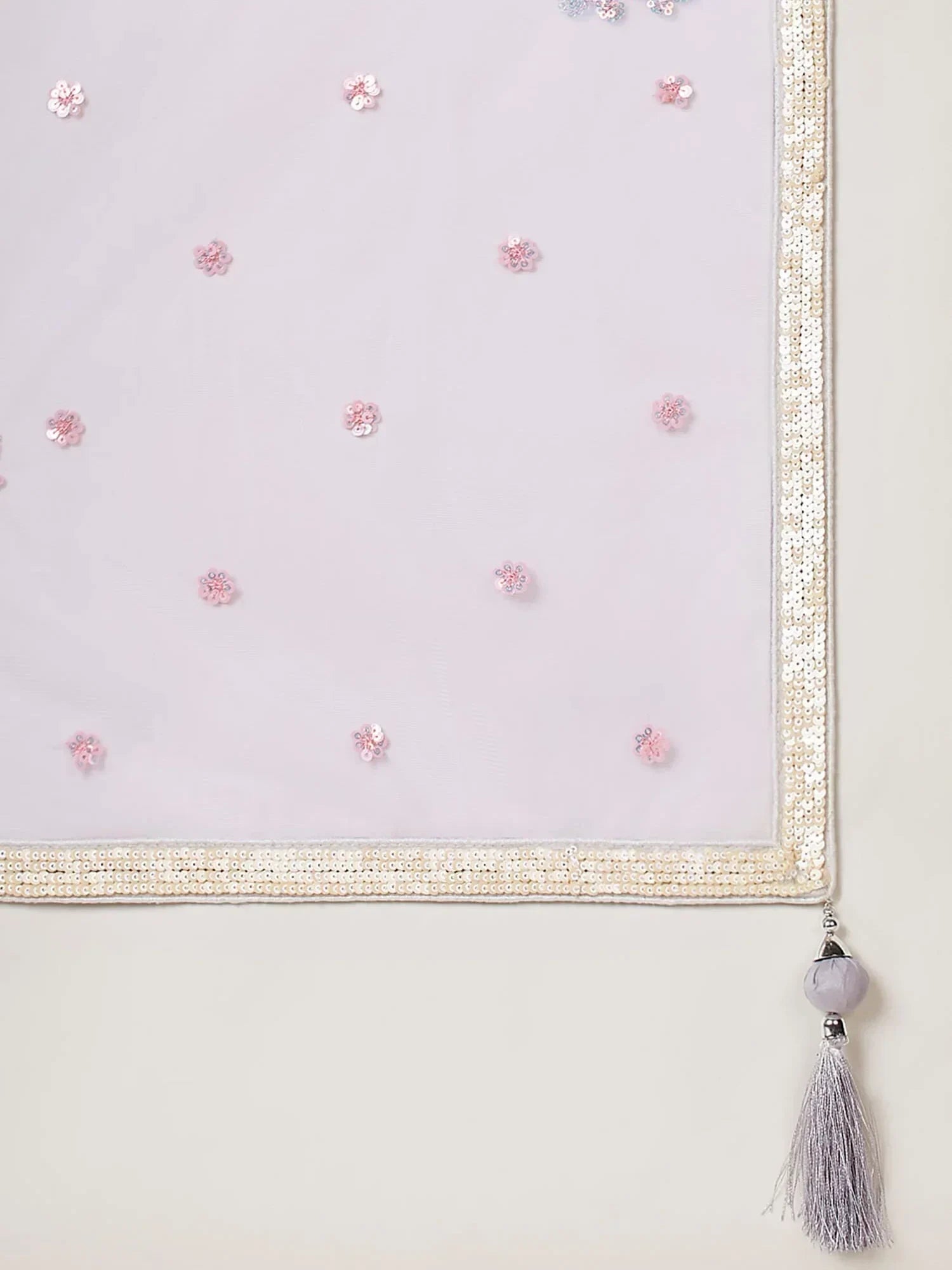 Elegant lavender dupatta with floral sequins, golden border, and tassel detail for ethnic wear