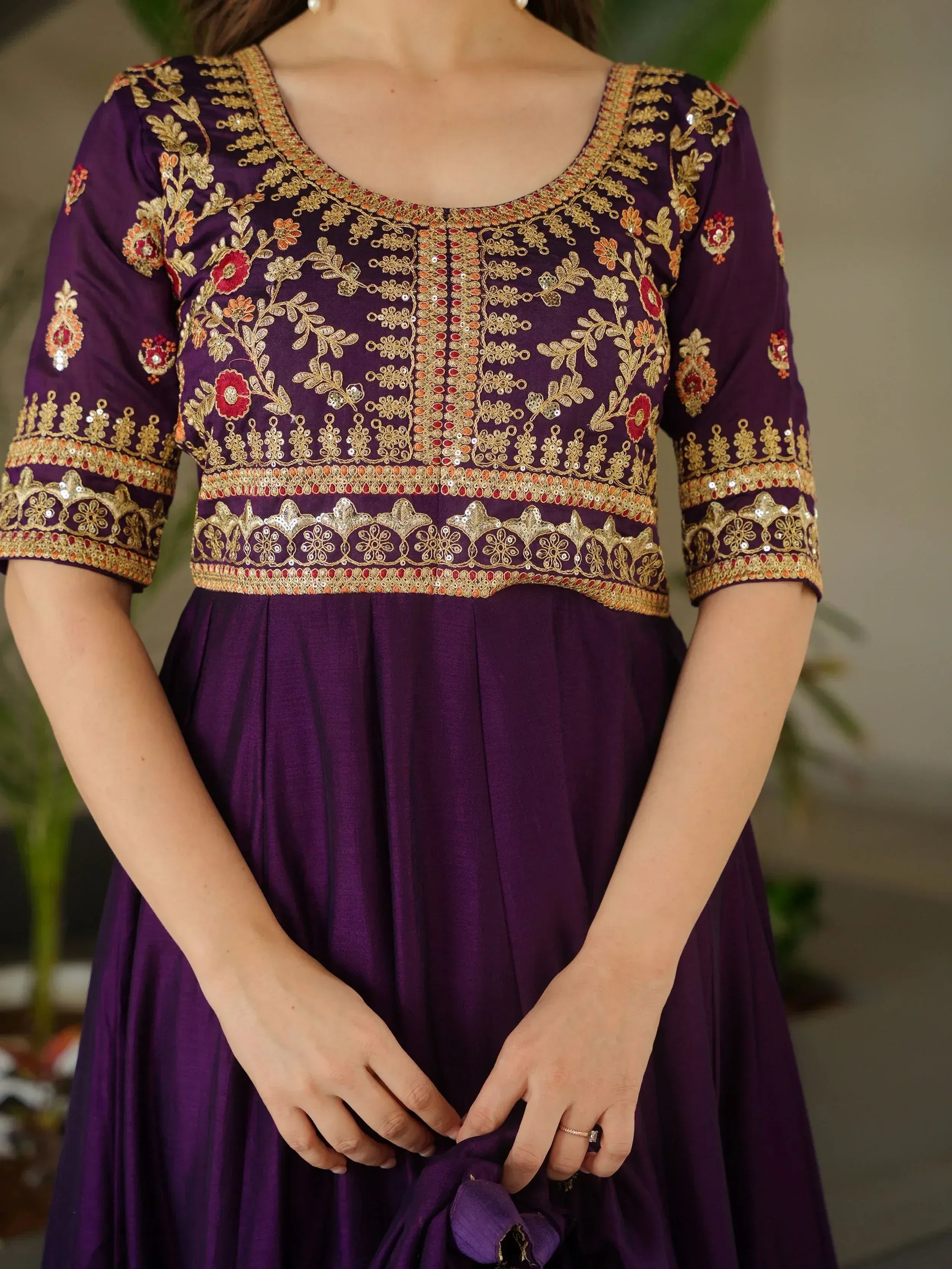 Purple ethnic gown with gold floral embroidery and sequin detailing for Indian wear