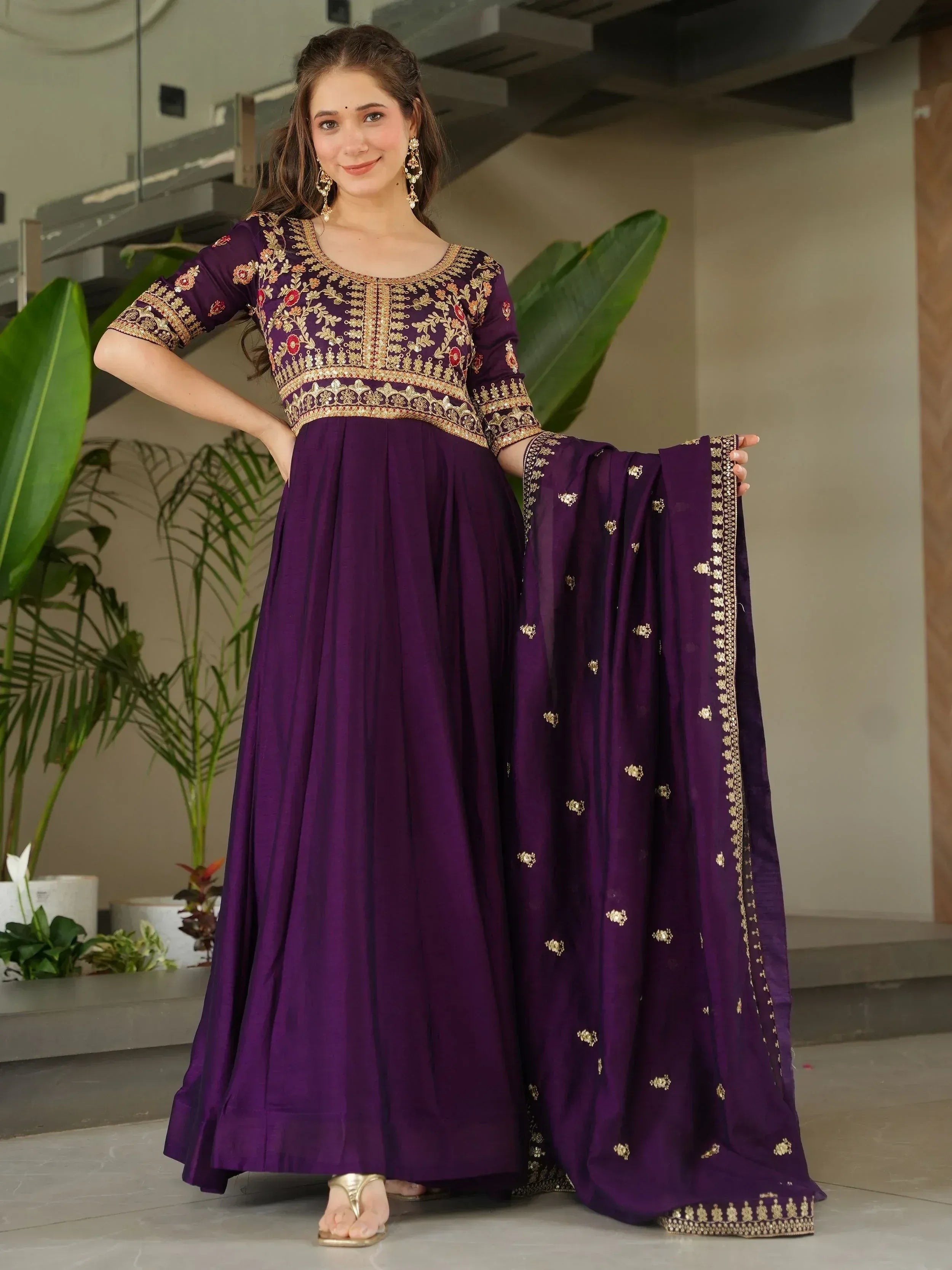 Purple embroidered anarkali suit with gold detailing, perfect for Indian ethnic wear occasions