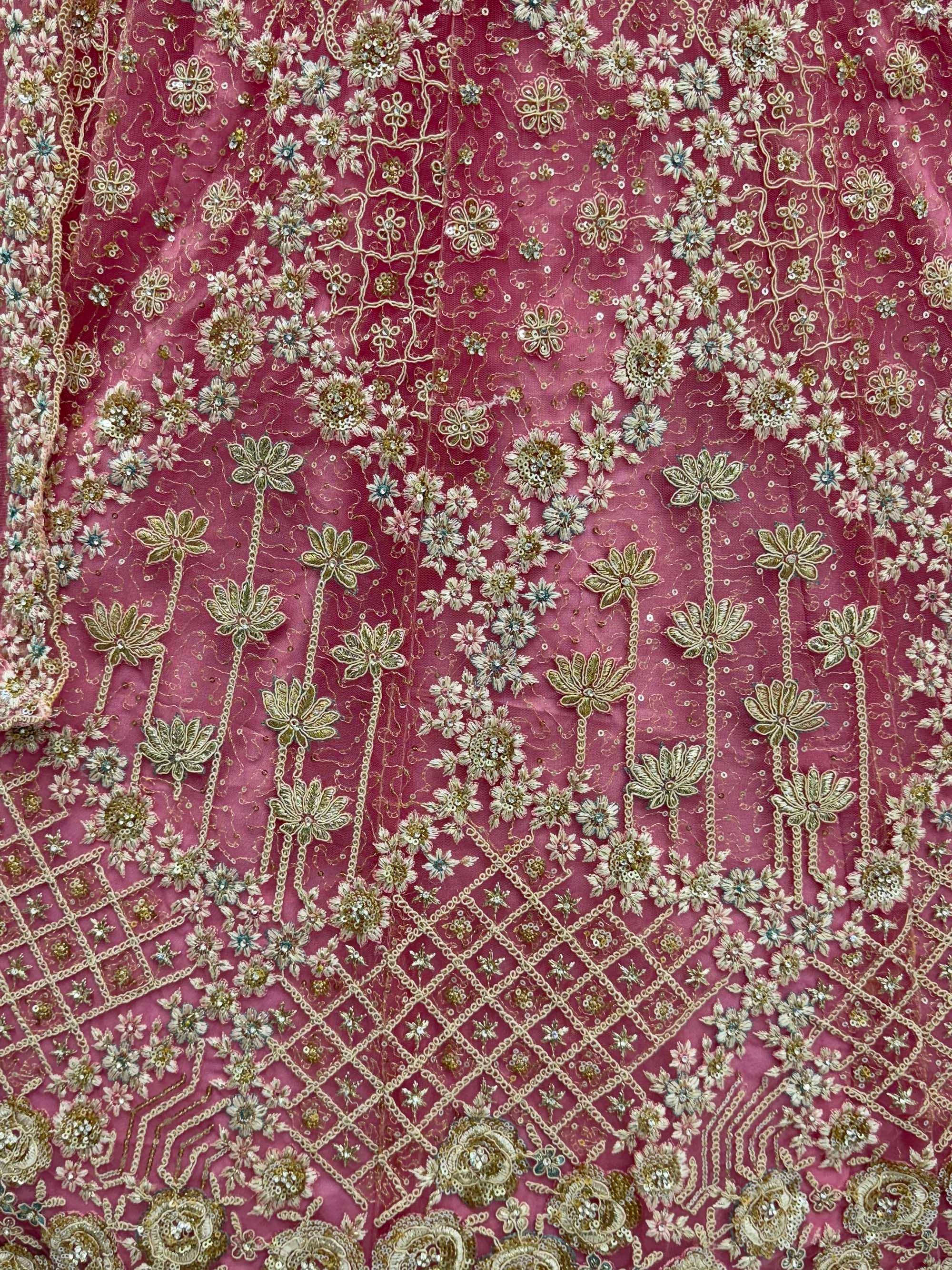 Pink ethnic wear fabric with gold floral embroidery and sequin detailing for designer lehenga or saree