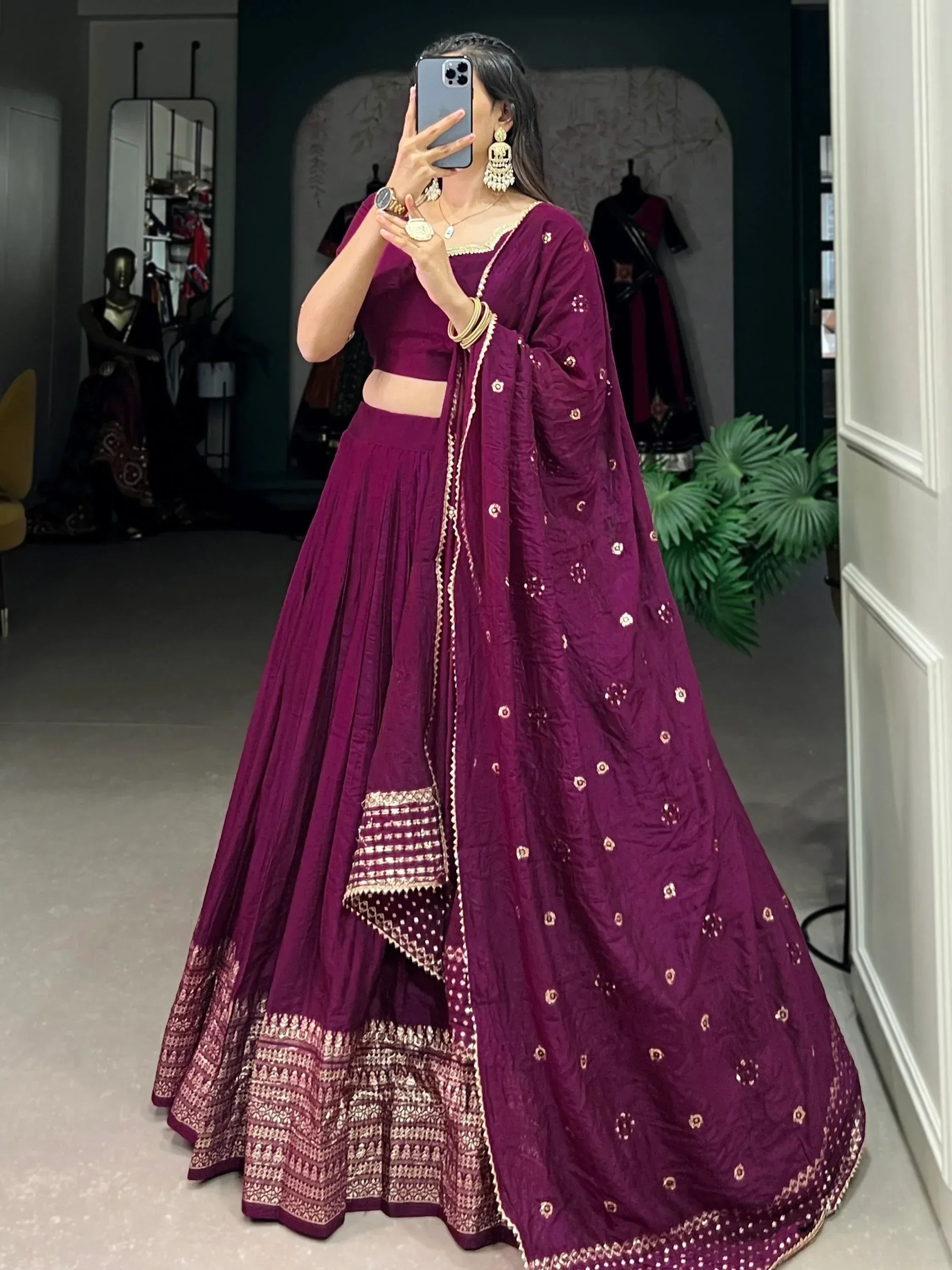 Purple designer lehenga choli with gold embroidery, perfect for Indian ethnic wear events