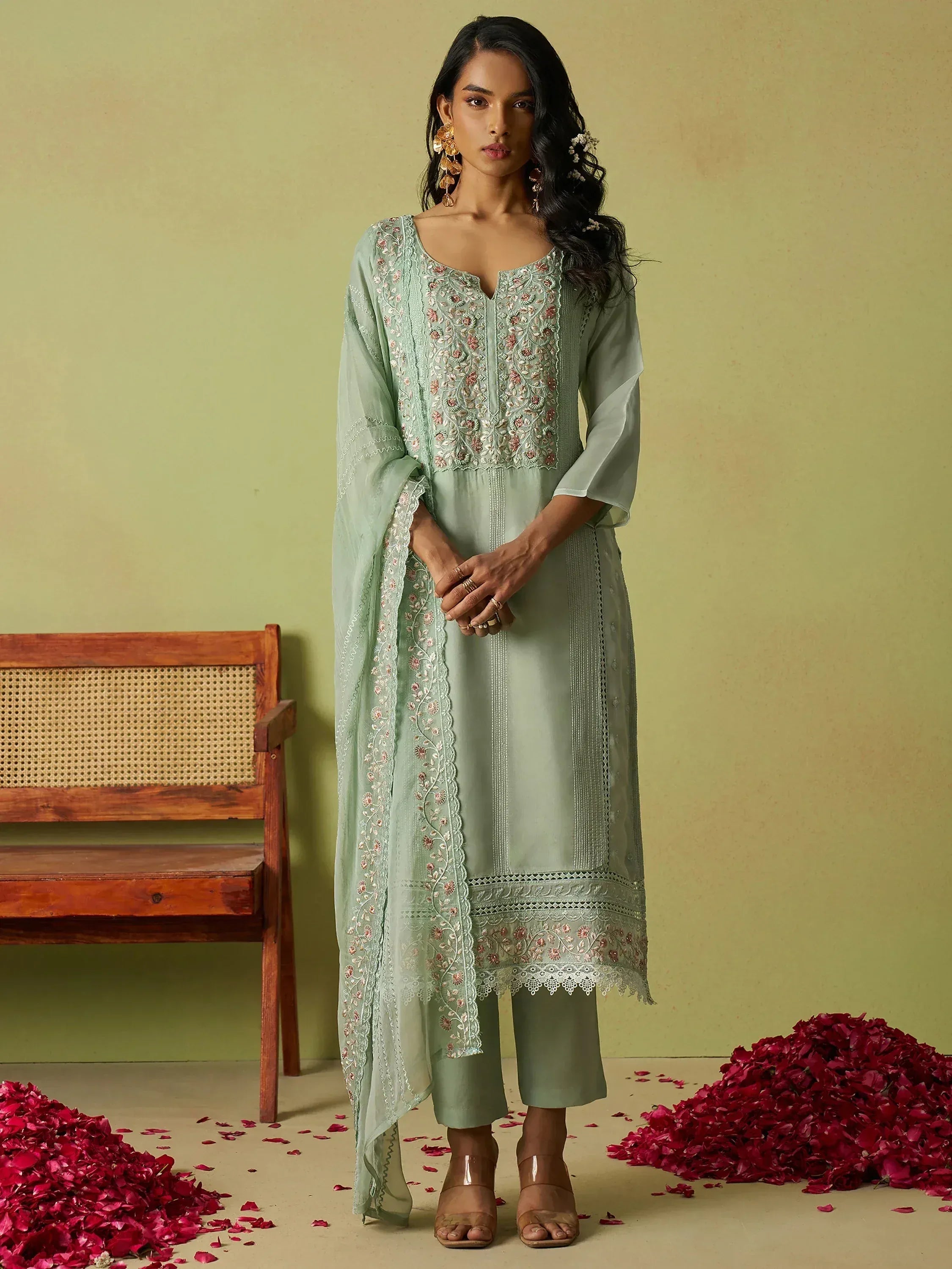 Mint green embroidered kurta set with floral detailing, perfect for Indian ethnic wear occasions.
